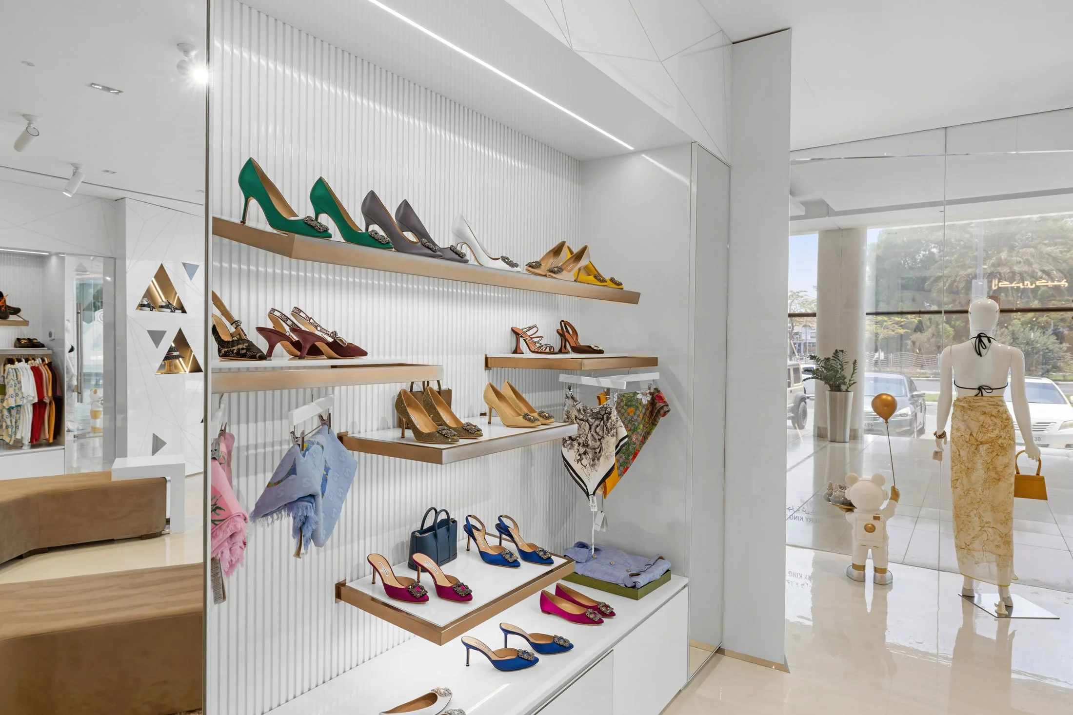 Boutique interior photography featuring luxury retail displays, carefully curated product presentation, and elegant store design.