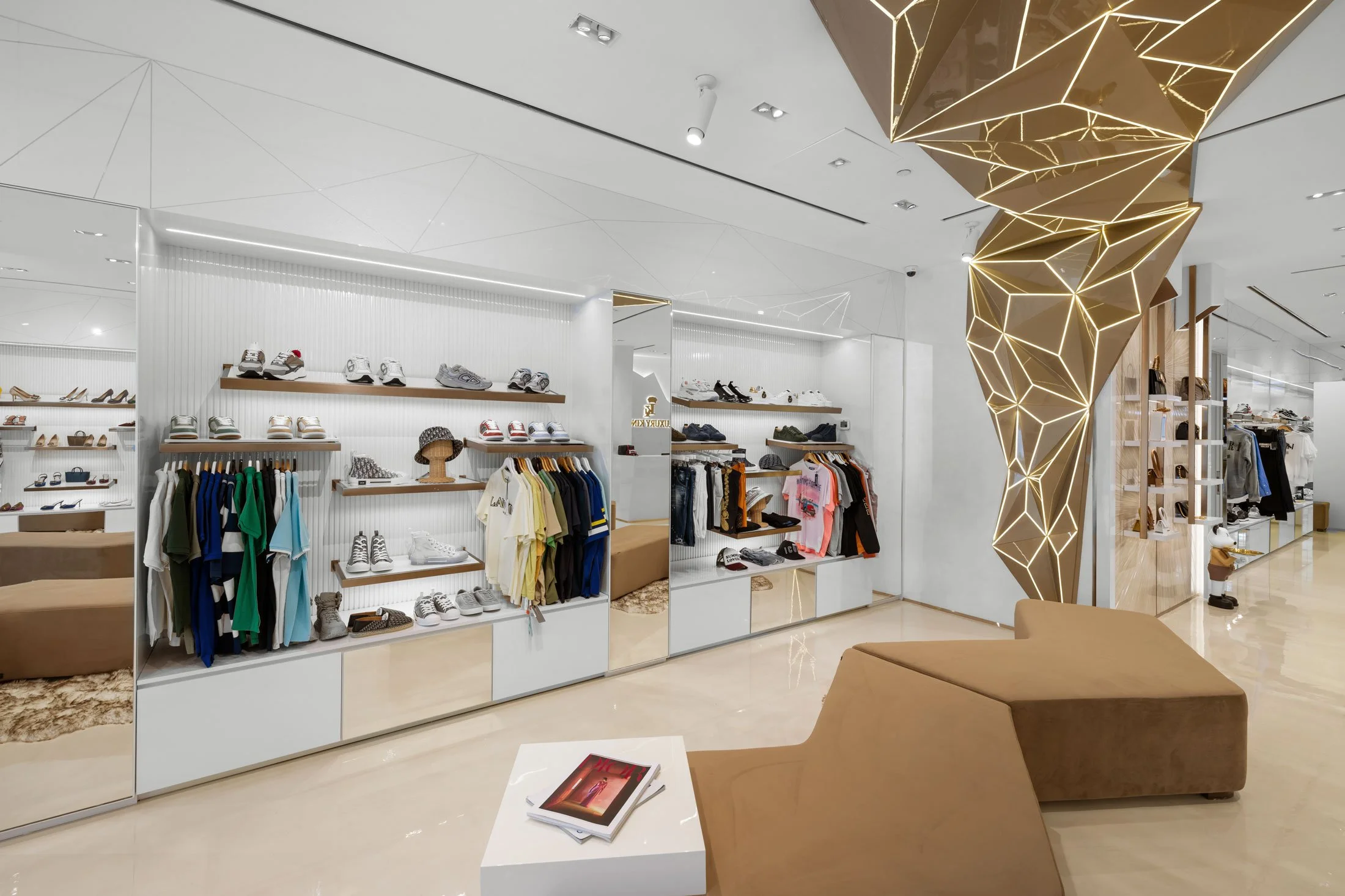 Retail photography showcasing a luxury fashion and lifestyle boutique with contemporary interiors and premium merchandising.