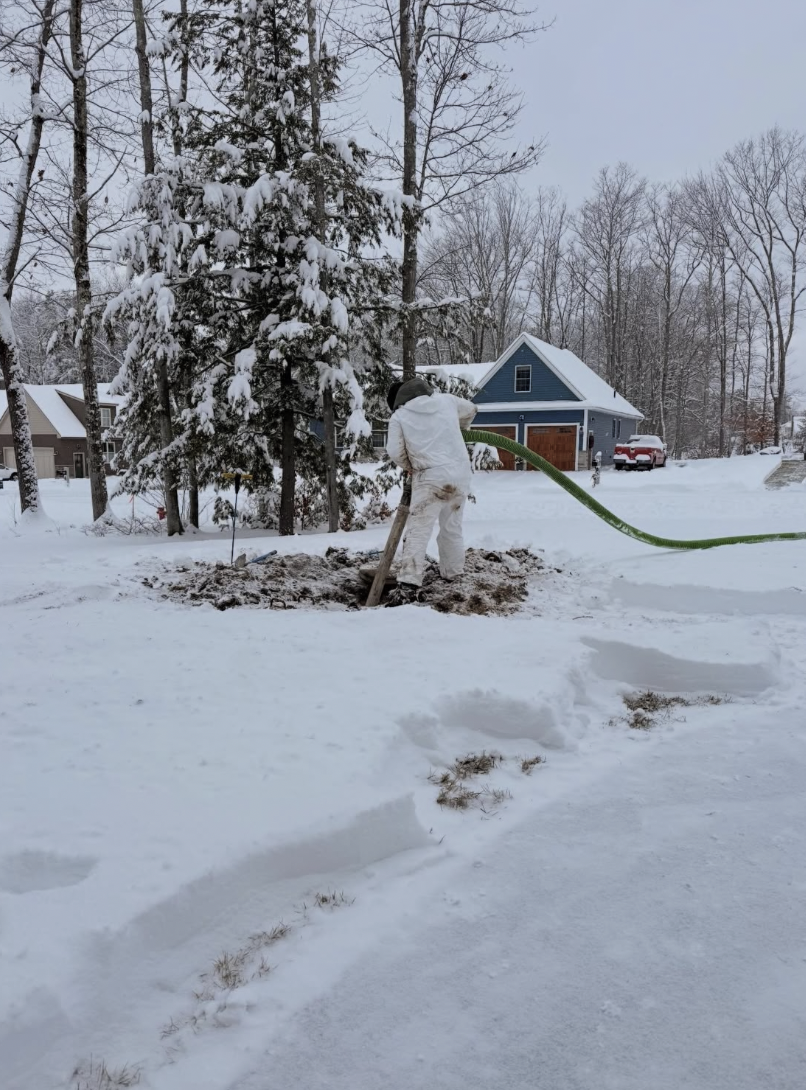 Pumping a customer's septic tank on Christmas Eve during a septic emergency call that Waste Warriors was hired to fix! 