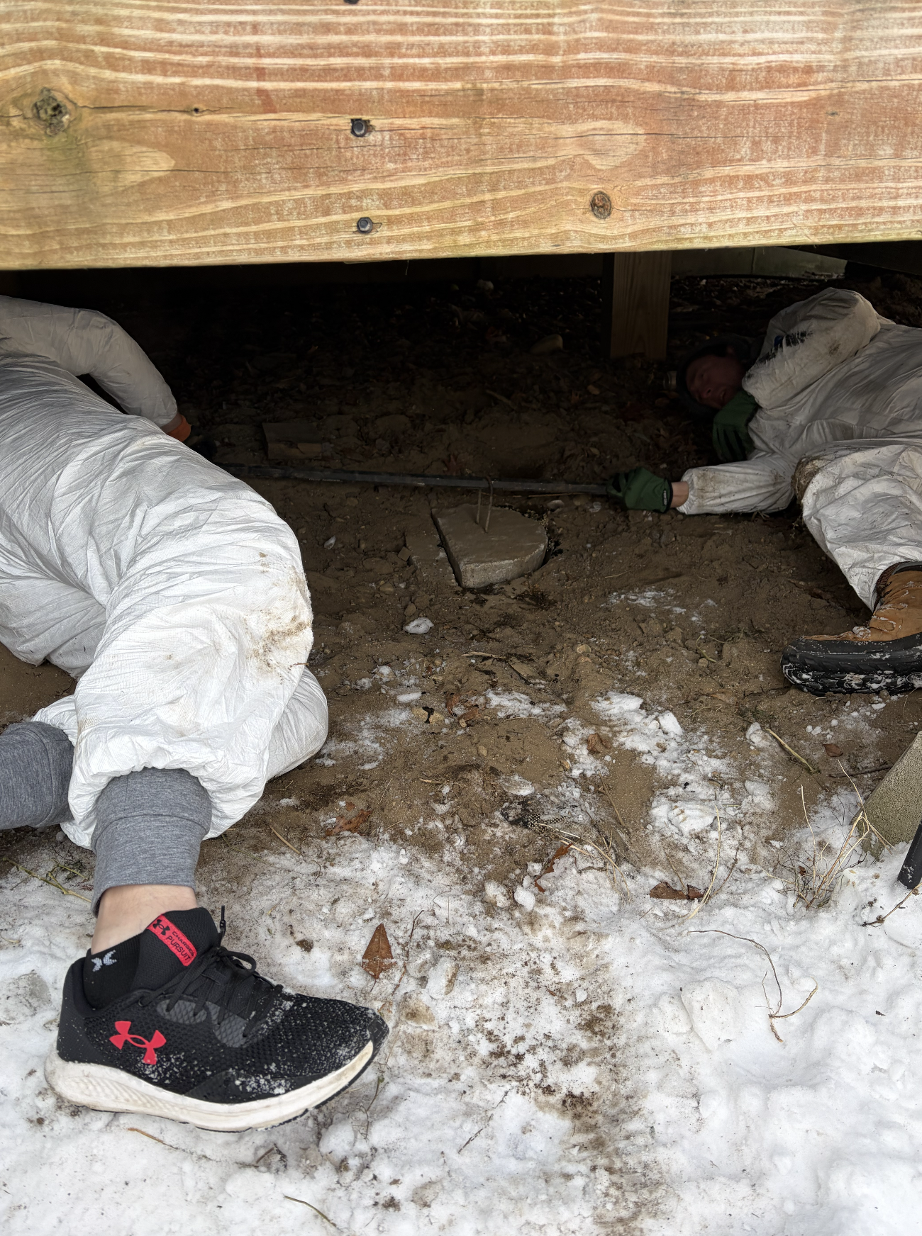 A deck was built over the septic system, but we got the lid off and pumped it anyway!