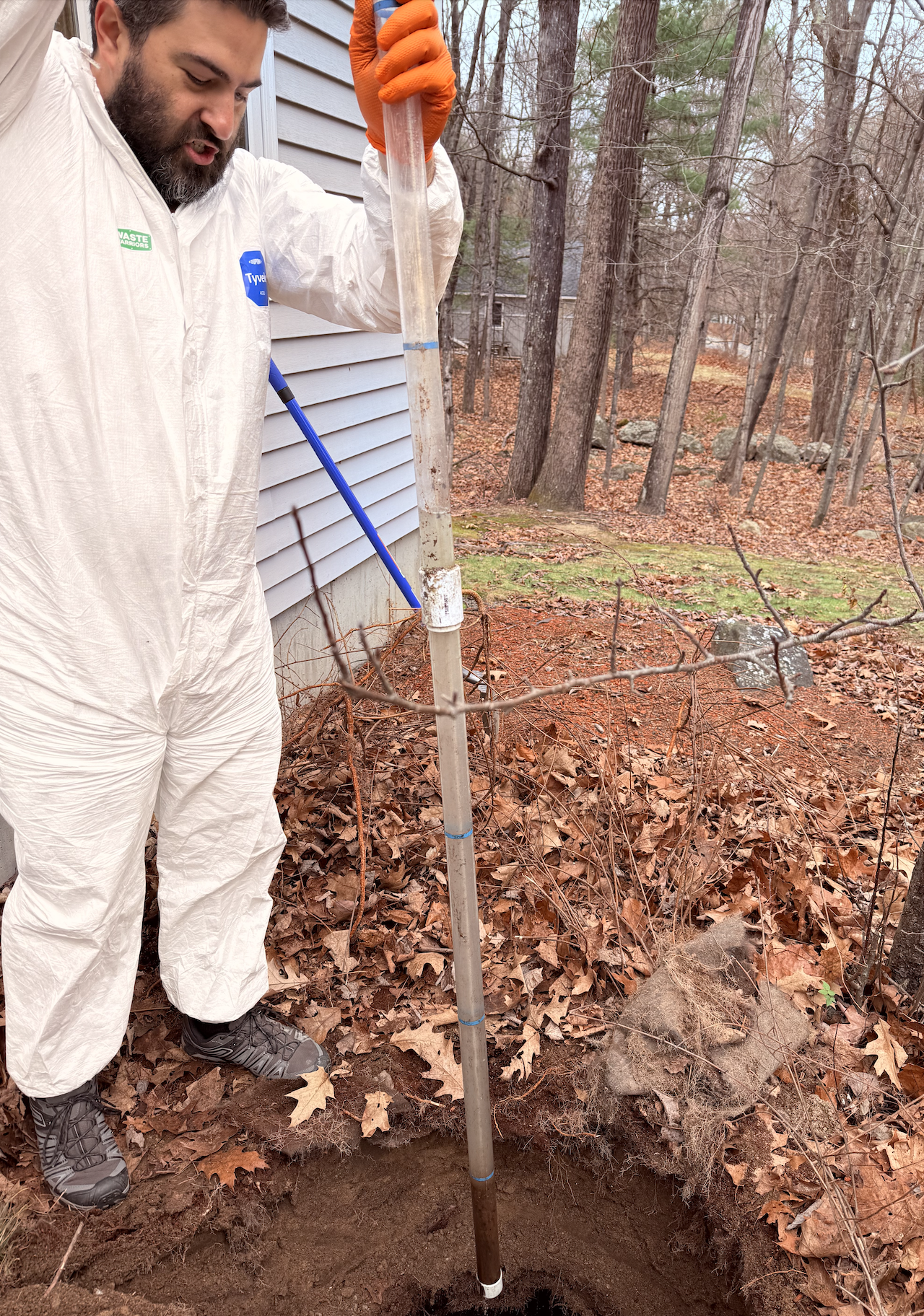 Taking a Sludge Sample. Included in each post pump report, Waste Warriors provides the customer with a sludge analysis which helps determine how frequently to pump their septic tank.