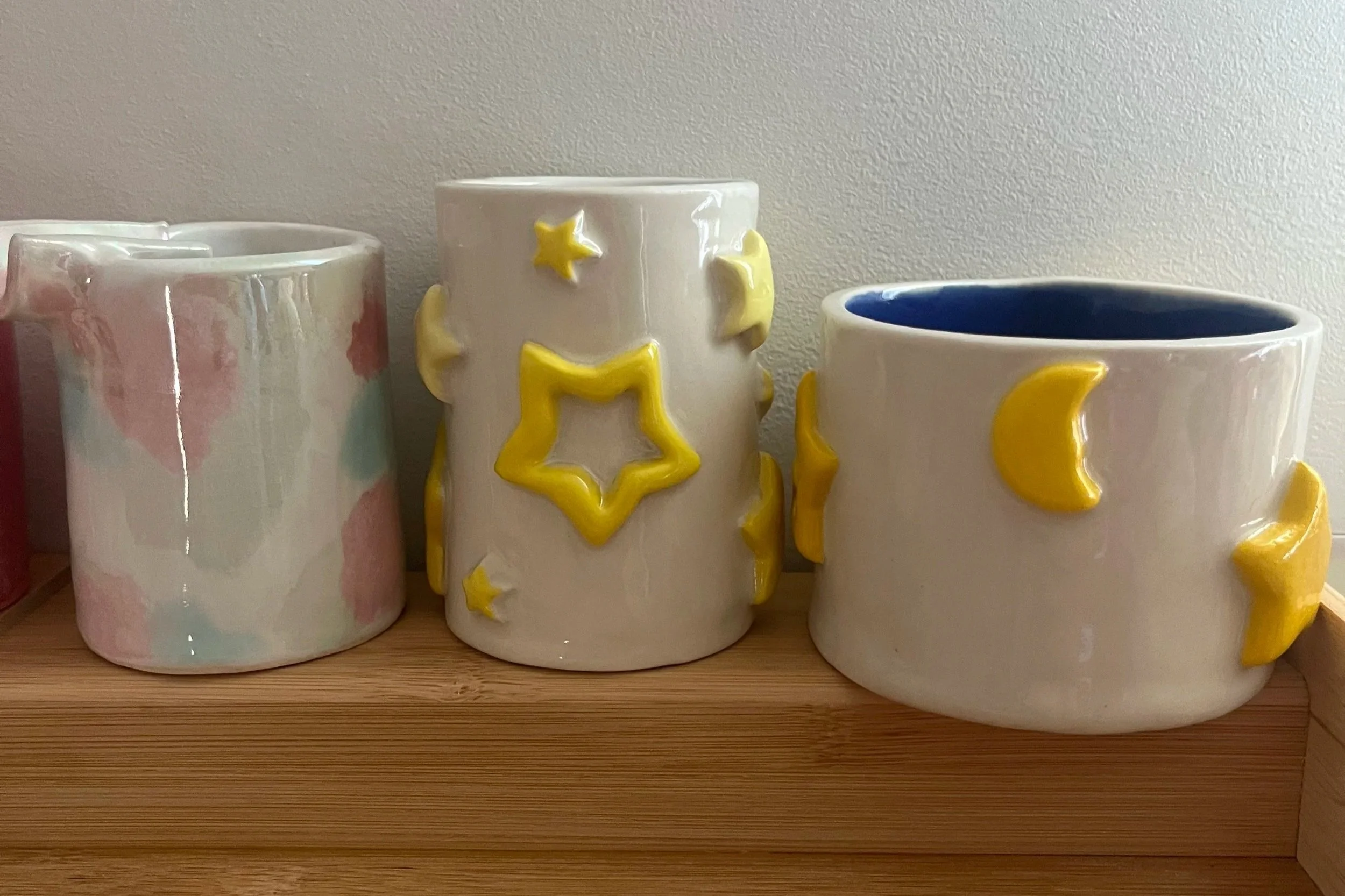 tall ashtray, star cups/pencil holders