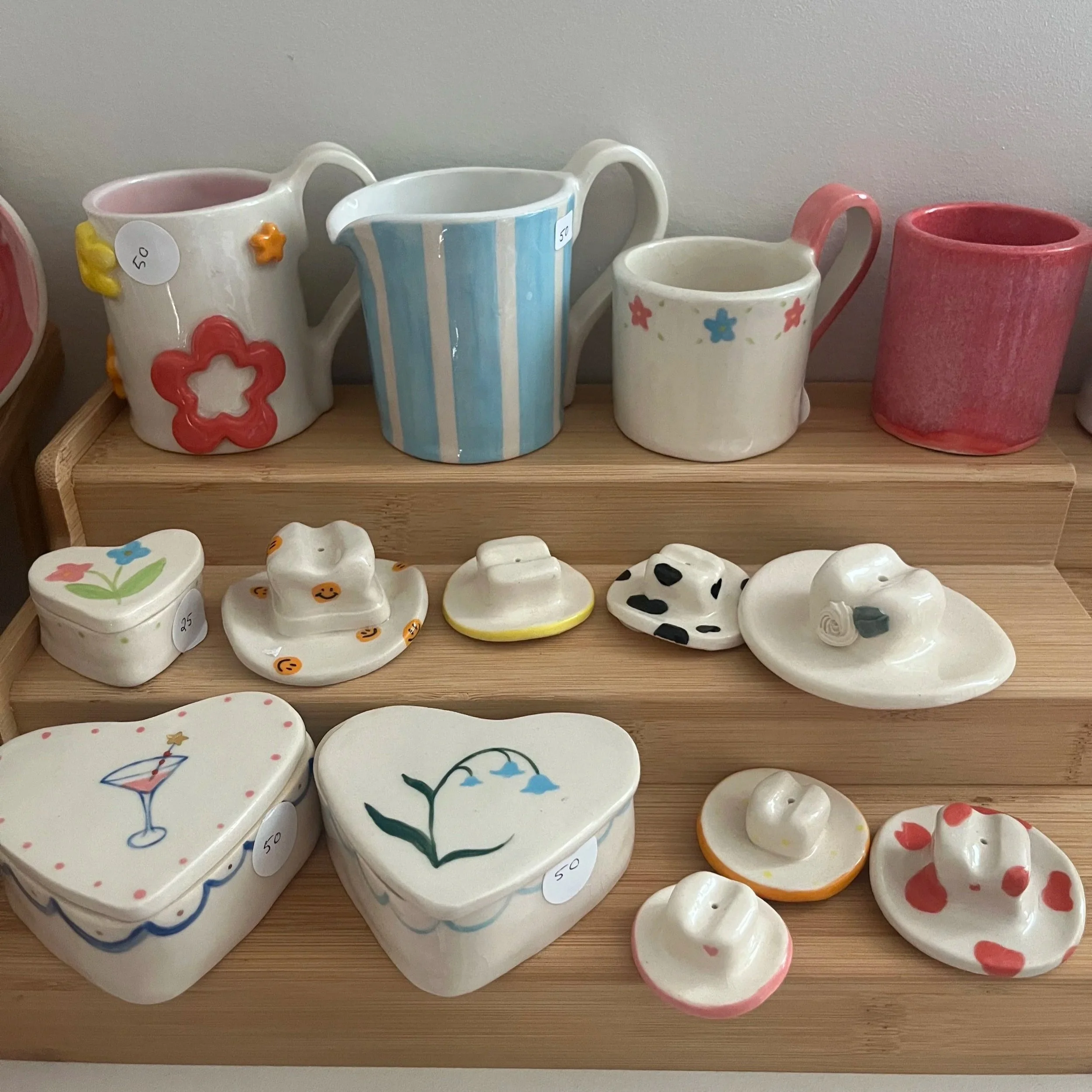cups, cowboy hat incense holders, trinket boxes