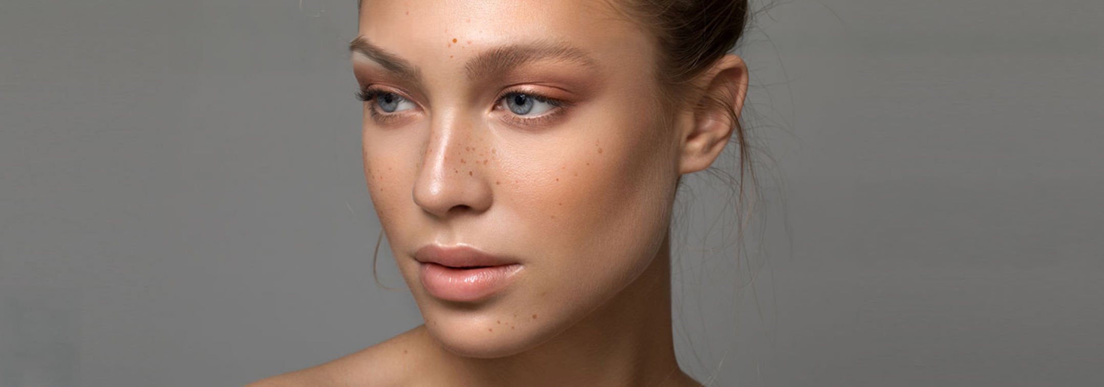 Image of female model with light tan and freckles