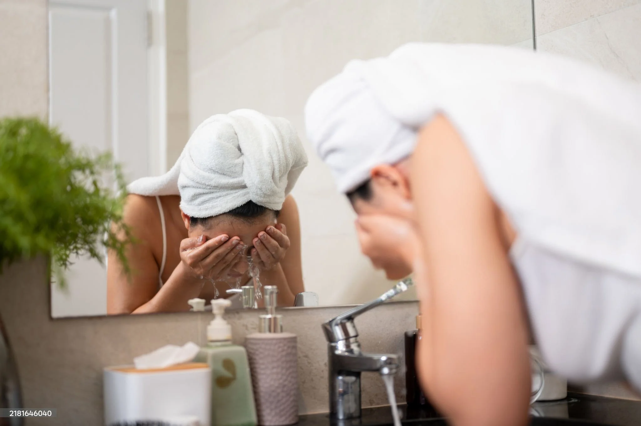 Woman washing face painting off after event in Eugene, Oregon