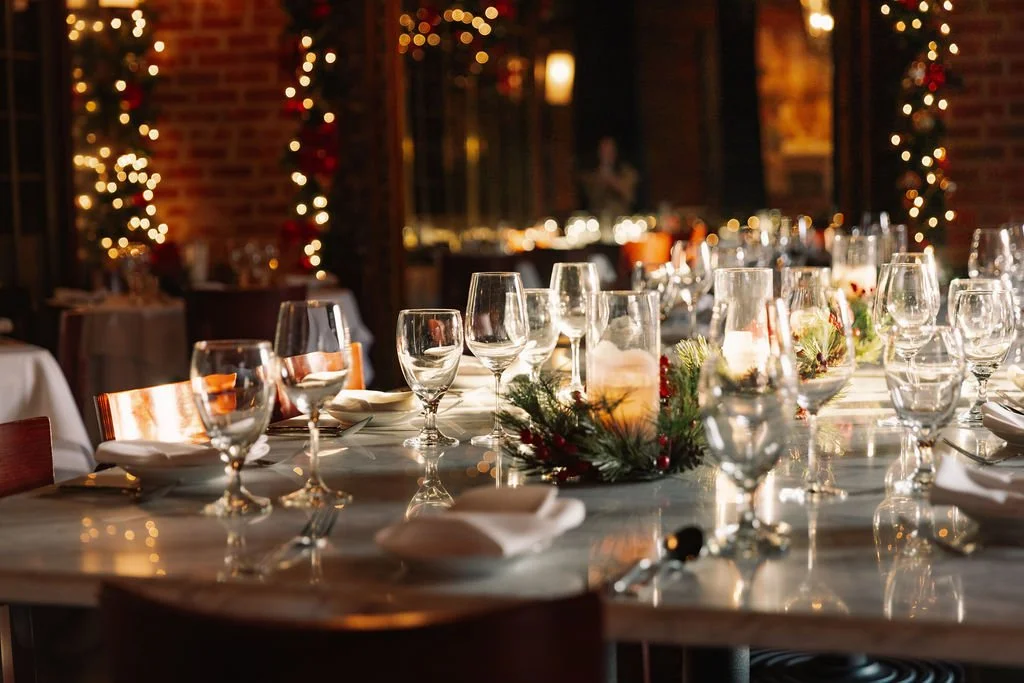 A festive table set for a holiday dinner at Circa 1922 in the upstairs dining room