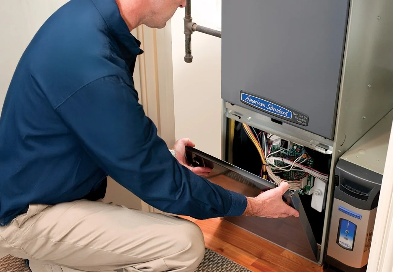 Oasis Heating & Air Conditioning technician helping with residential air conditioning and heating service by Redding HVAC experts