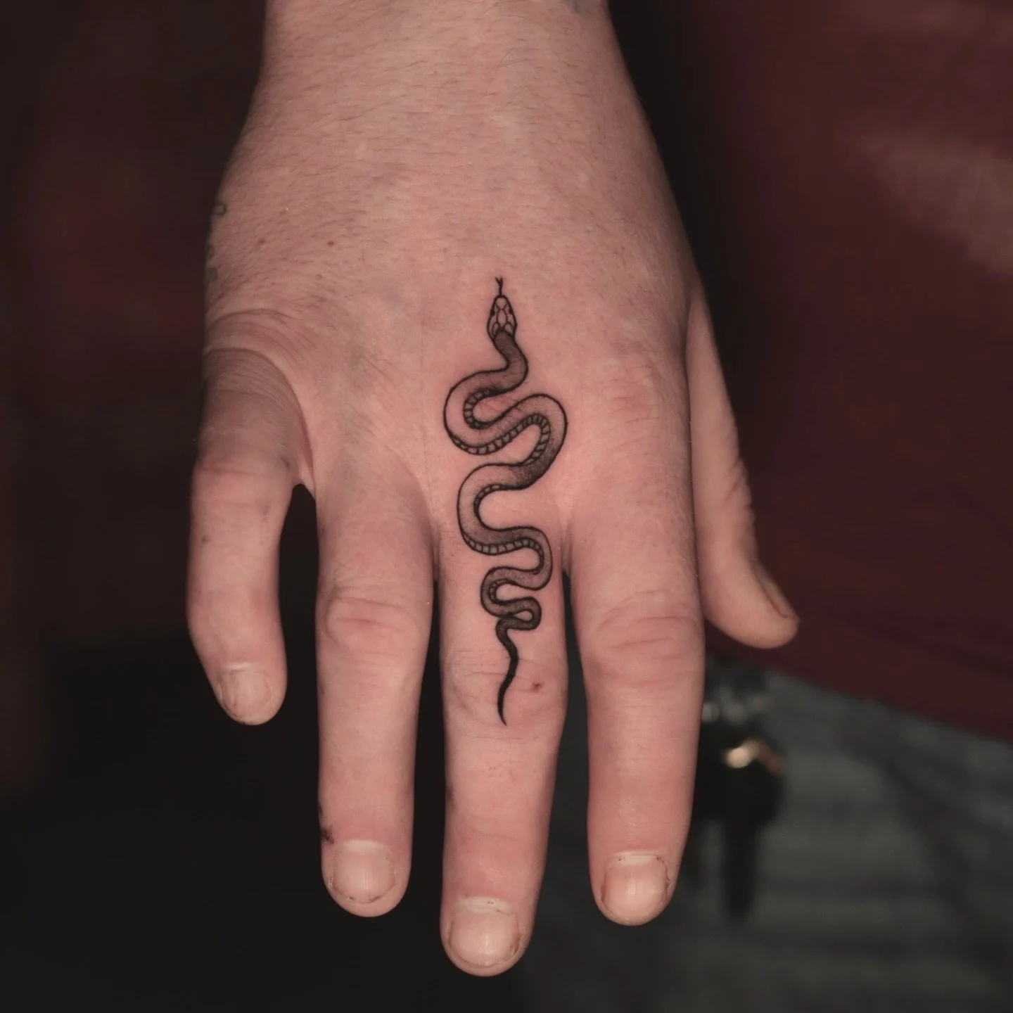 Snake on finger tattoo and other stuff! 
Big or small, inkdozer got it all. Fill the booking form and Book your appointment or free consultation. Check www.inkdozer.com or feel free to call 📞 (980) 745-7596