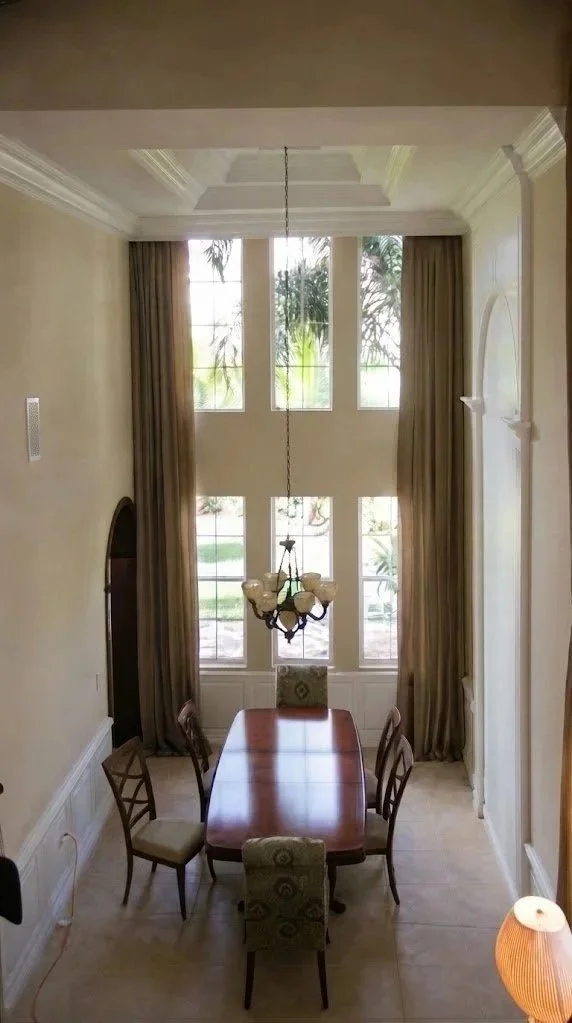 Custom Window Treatments: Tailored drapery for windows of any shape or size, expertly framing high and wide glass.