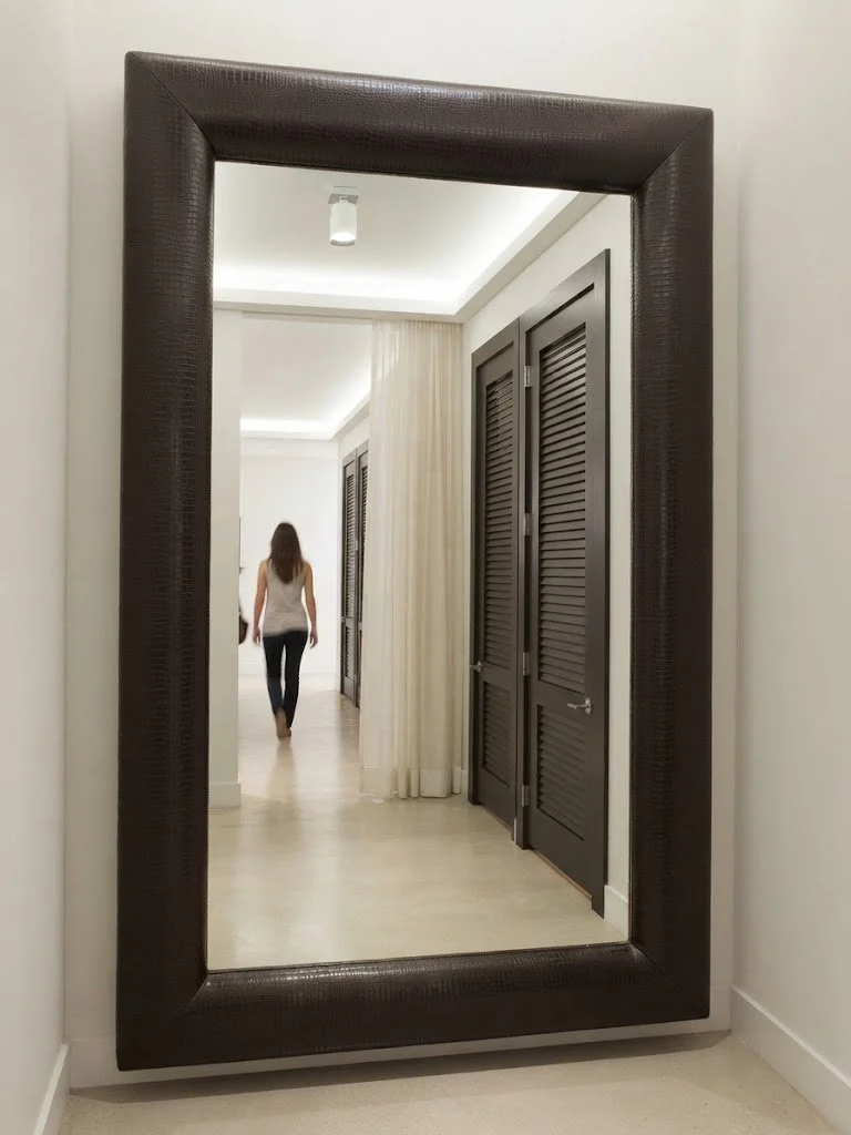 Custom upholstered mirror and luxury drapery details crafted by London Stitchery for interior designers and decorators.