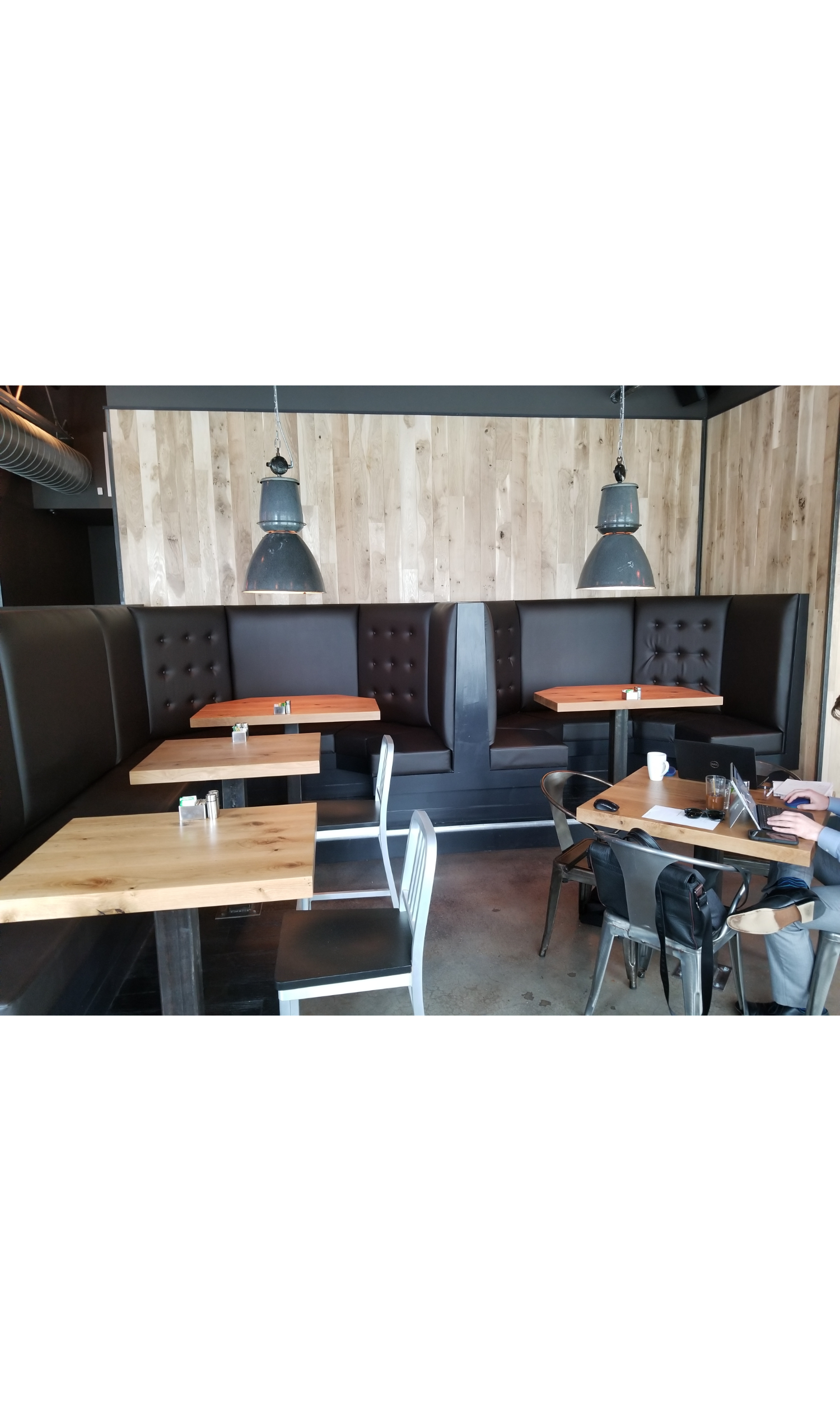 Custom-fabricated upholstered booths for hospitality and restaurant interiors