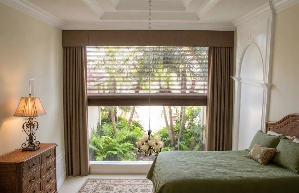 Rich chocolate brown custom draperies paired with a tailored upholstered cornice, designed for a luxury bedroom suite by London Stitchery.