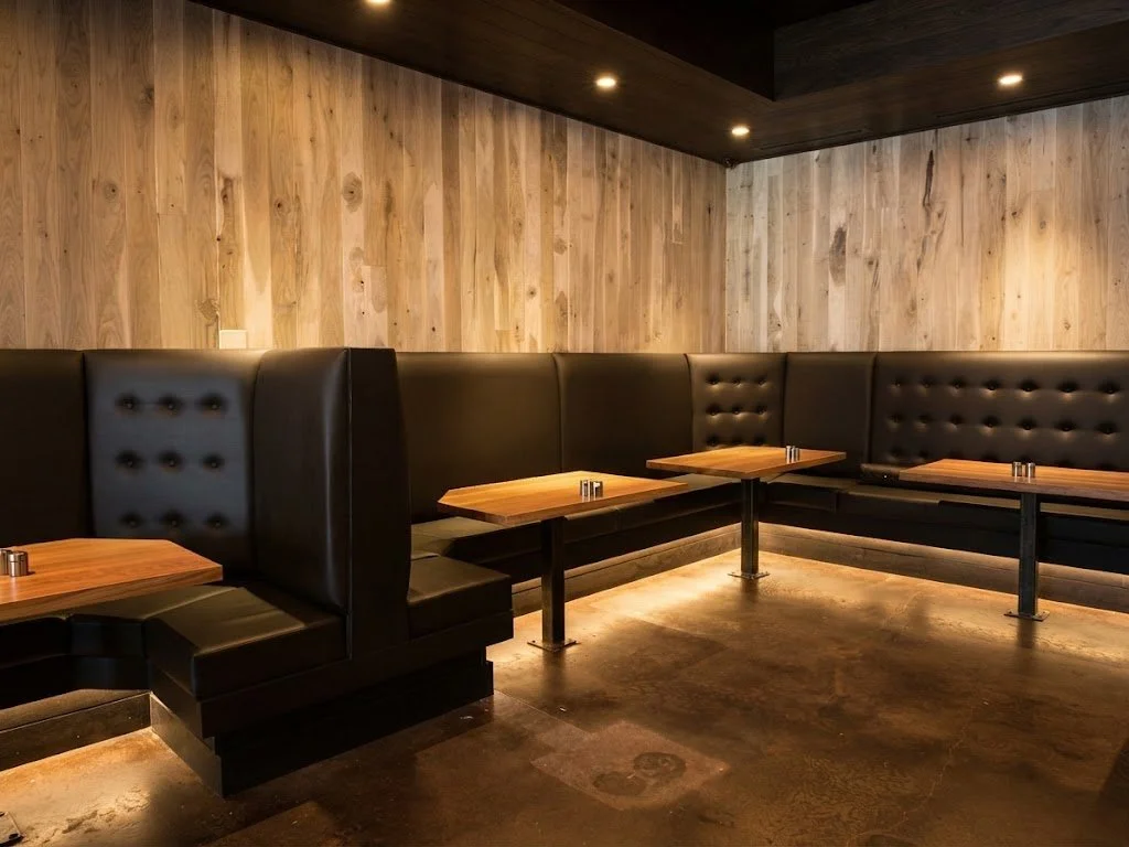 Custom commercial banquette booth seating upholstered for Milkmoney restaurant and coffee shop, crafted by London Stitchery.