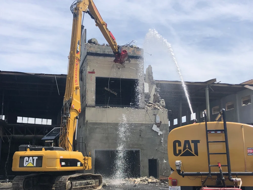 Excavator fitted with a demolition attachment