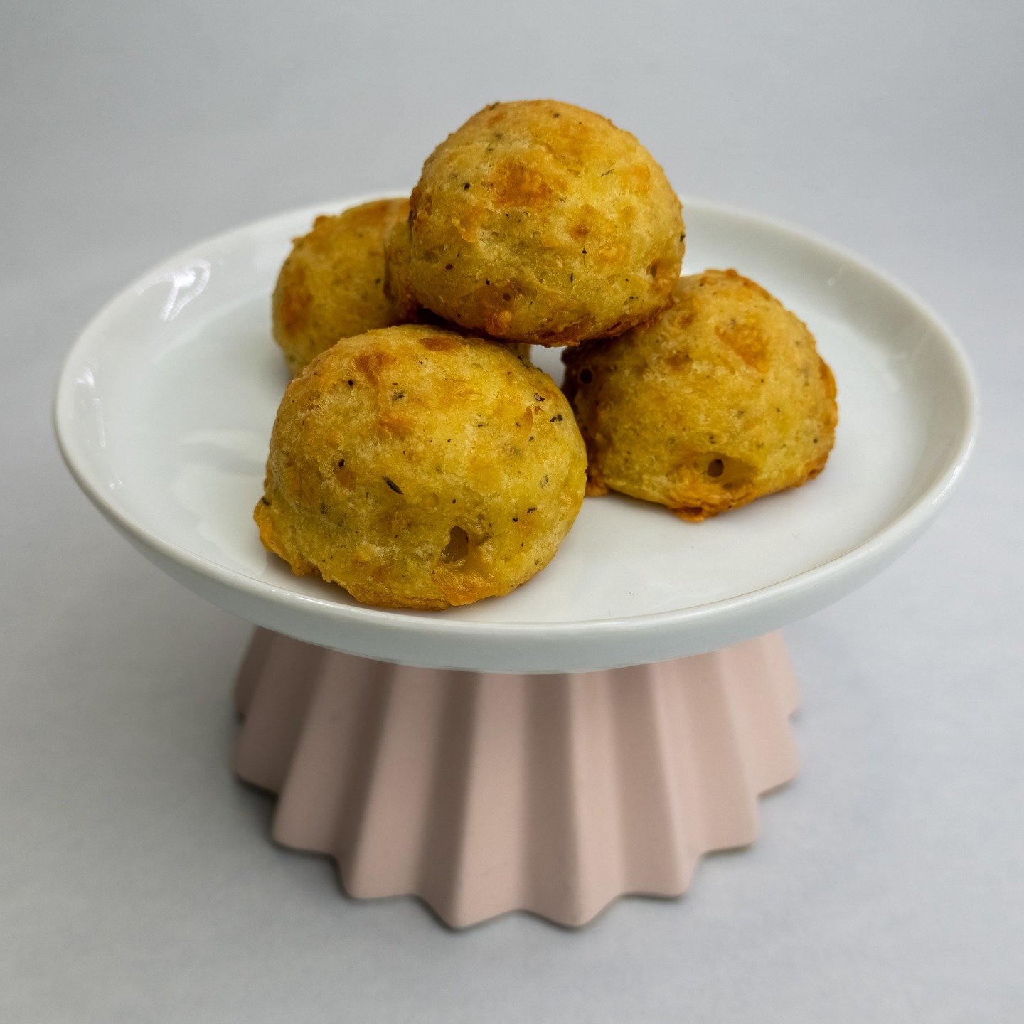 While others settle for snacks, we craft experiences. Our Puff of Genius&trade; is made with Comt&eacute; and classic p&acirc;te &agrave; choux, designed for those who demand more from their palate. It&rsquo;s sophisticated, irresistible, and deliver