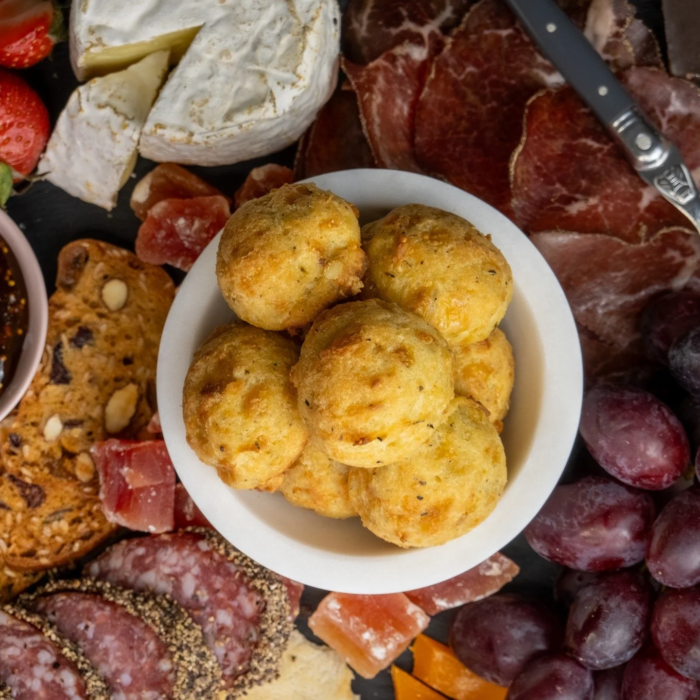 Your charcuterie board is officially missing its centerpiece. 🧀

A board of meats and cheeses is a start&mdash;but a warm, savory Puff of Genius&trade; is the finish. Infused with the complex, floral notes of premium Comt&eacute;, our goug&egrave;re