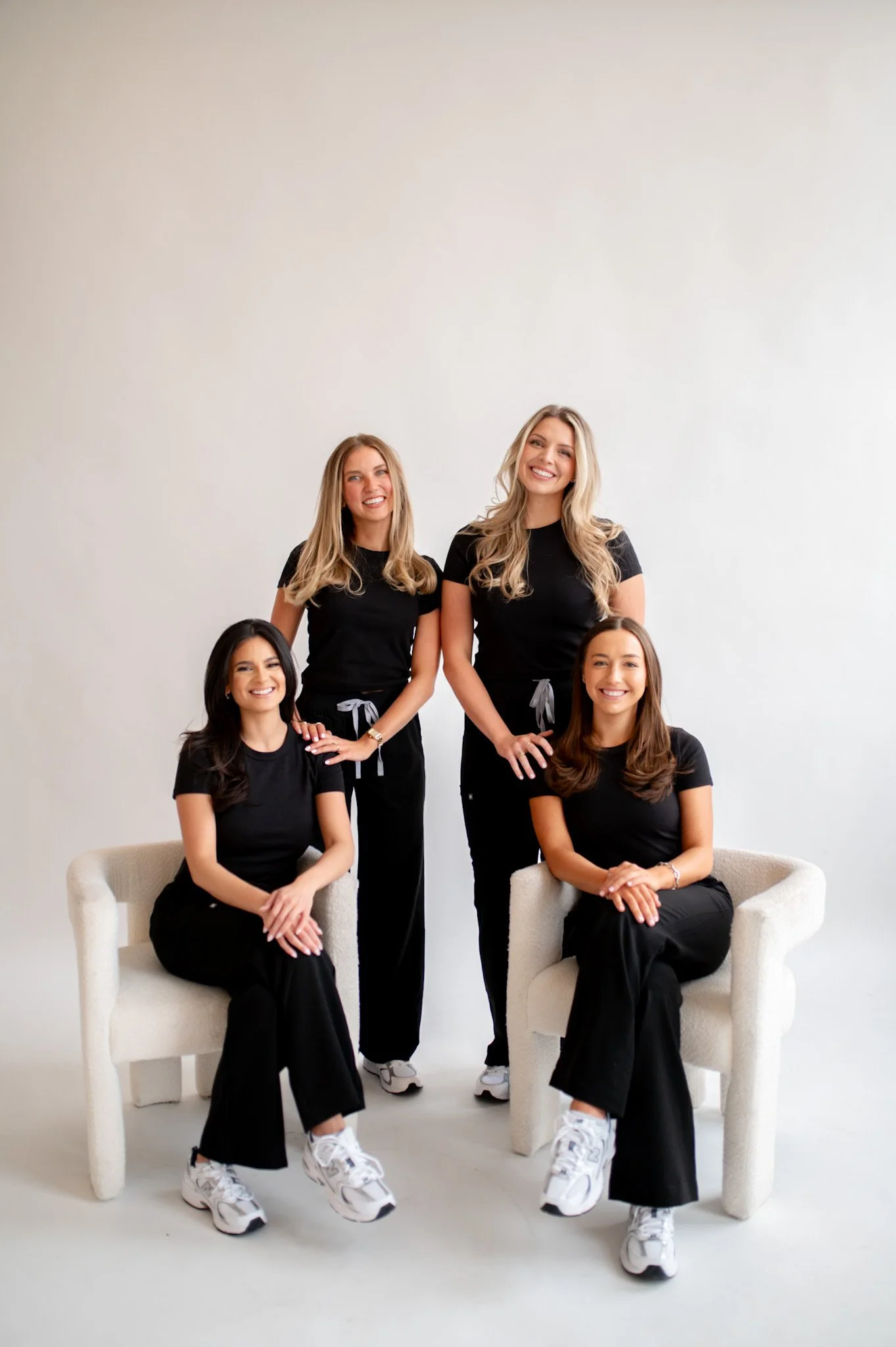 Four girls in scrubs