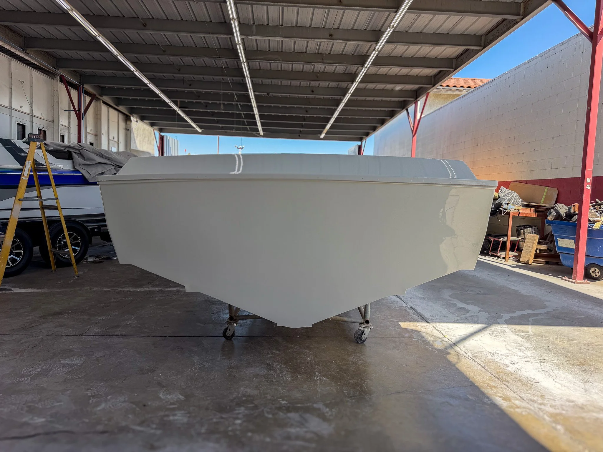 boat hull transom made from fiberglass in a boat shop