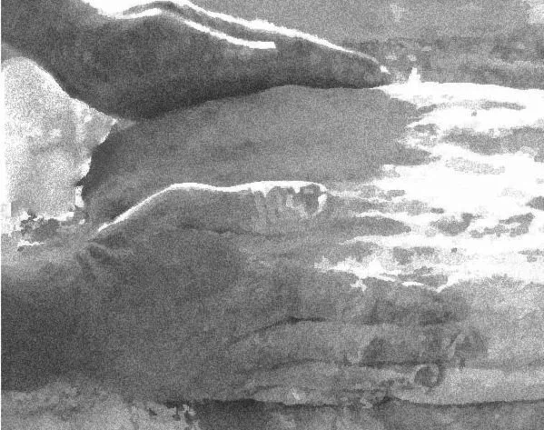 Black and white photo of hands on a dough ball