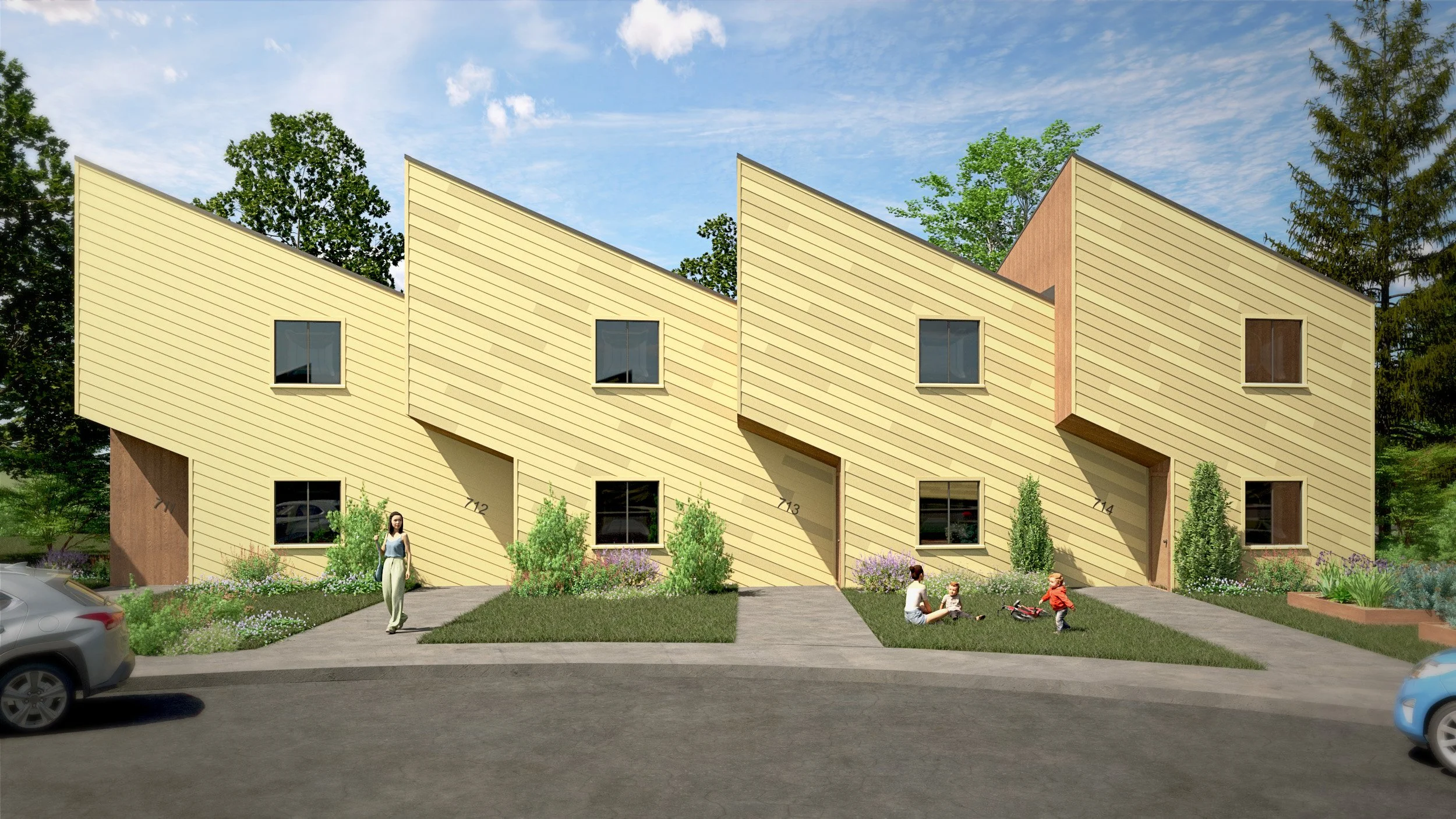 AFFORDABLE TOWNHOMES: a row of dynamic sculptural facades behind grassy front lawns.