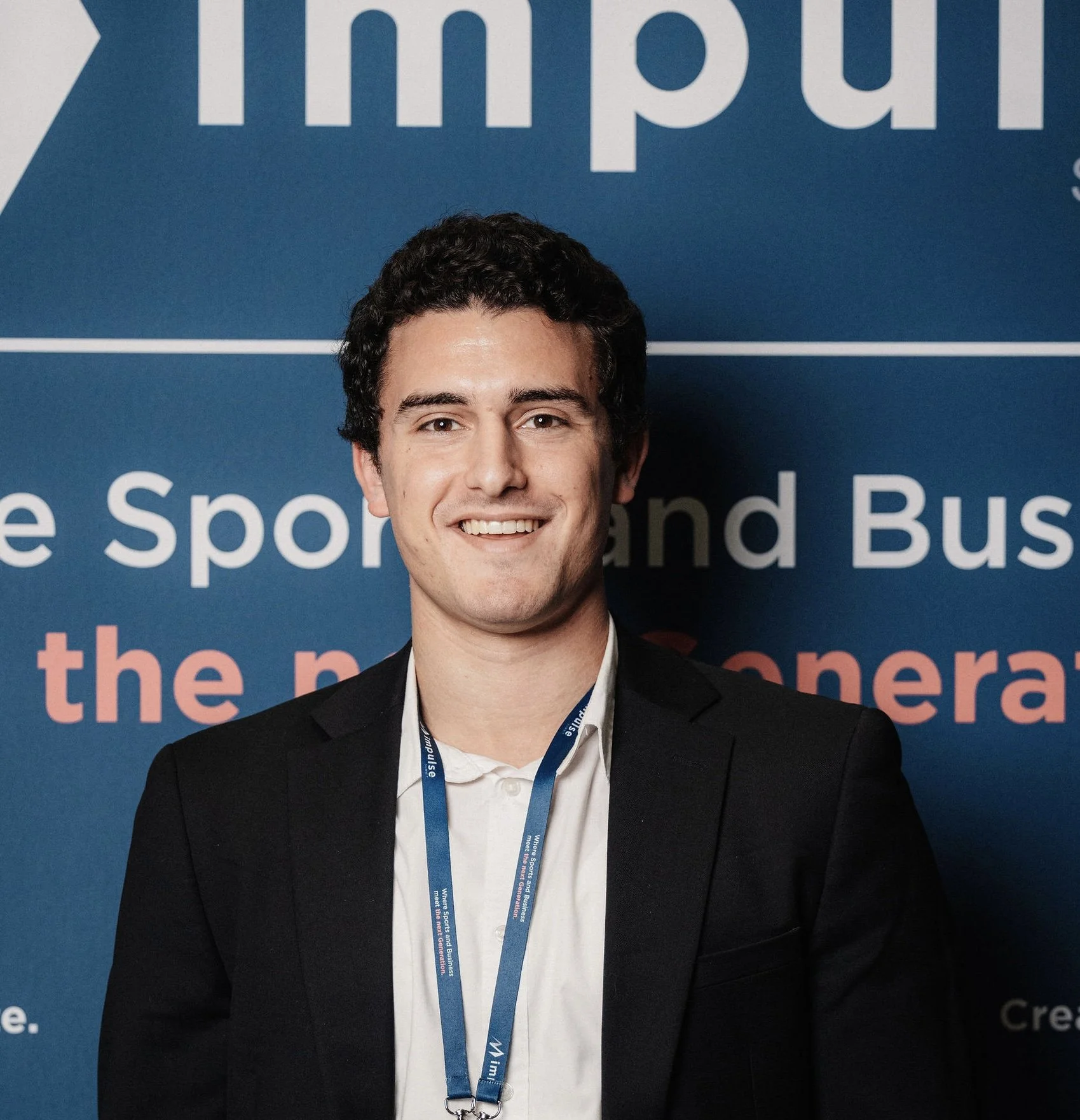 Zach Lubin profile photo at the Impulse Summit in Switzerland where he elevated discussion on sports and sustainability.