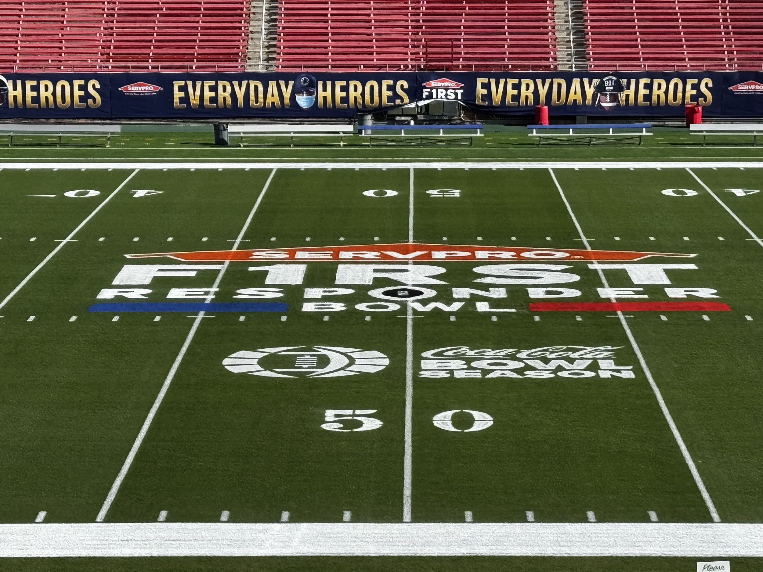 Hand painted First Responder Bowl center logo with Coca Cola at SMU Gerald J Ford stadium.