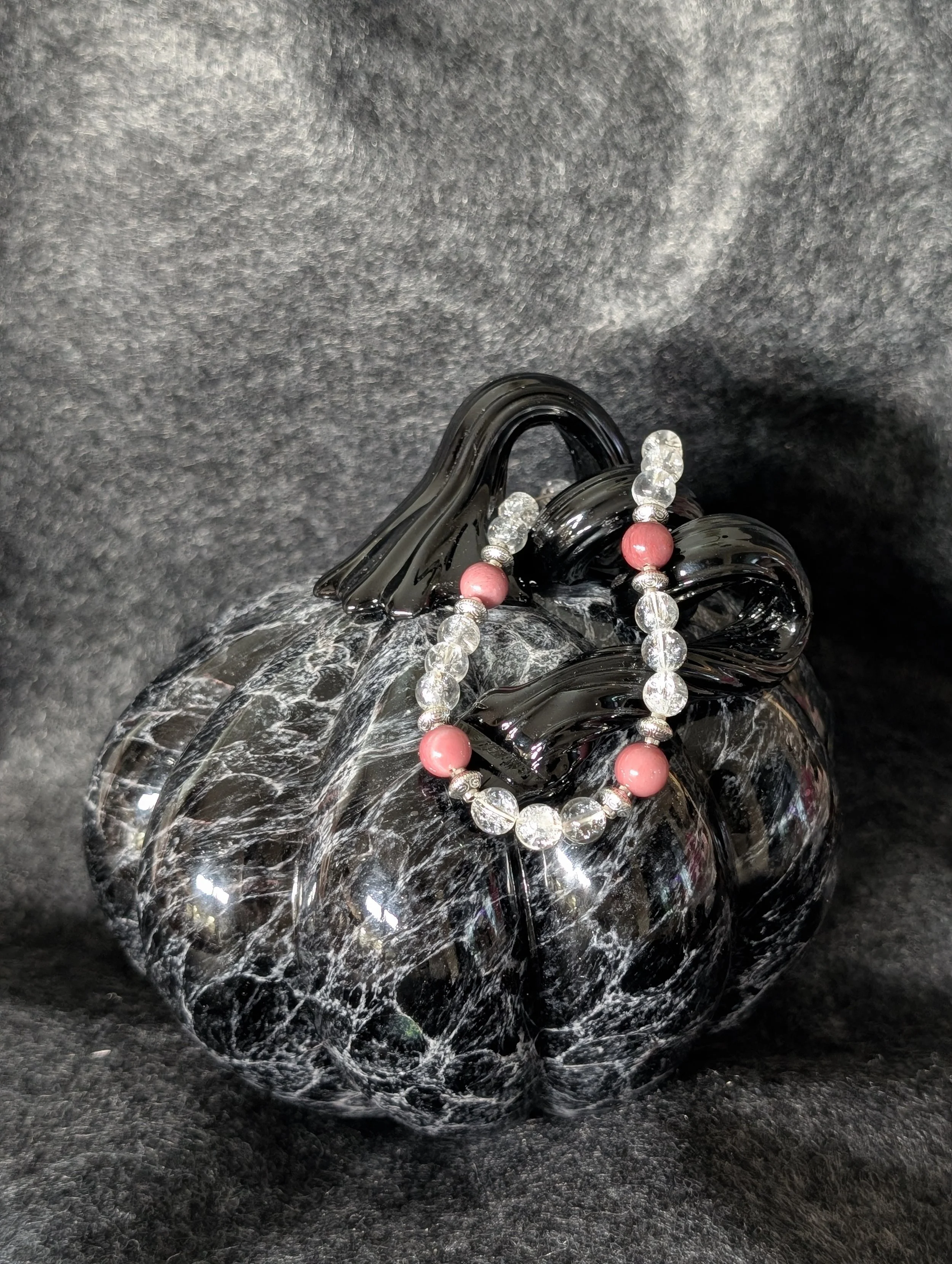 A necklace and earring set in fire quartz with Pink Rhodonite accents