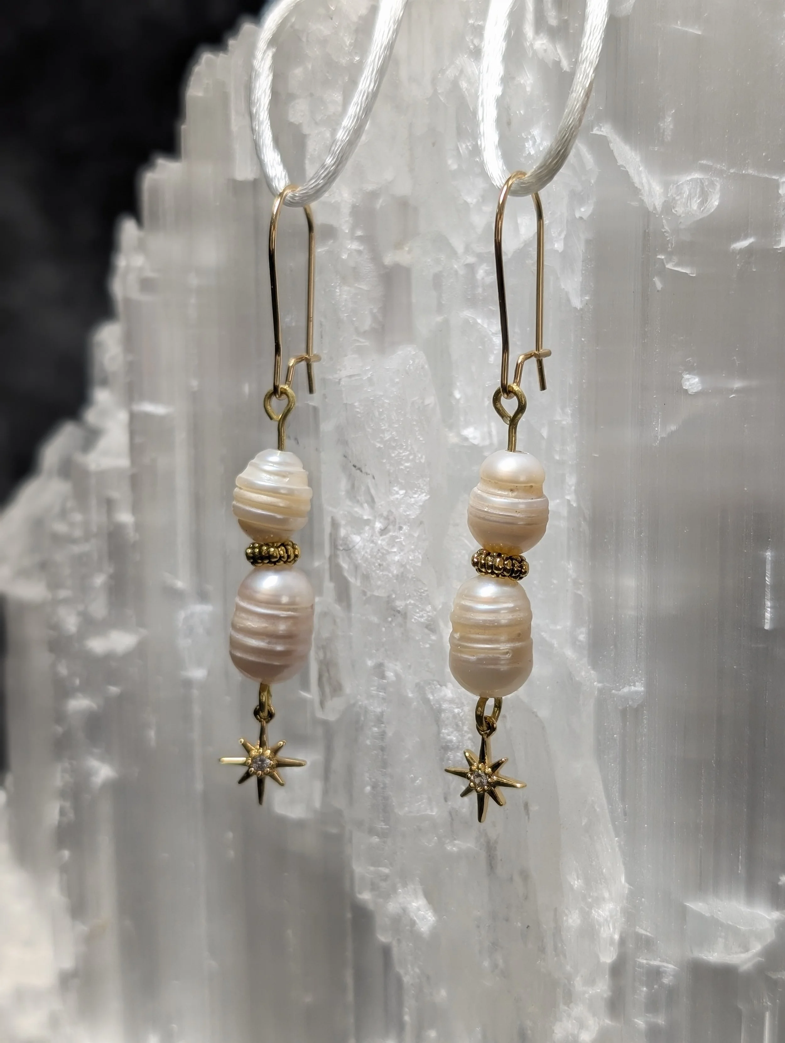 Gold colored freshwater natural pearl earrings with stars
