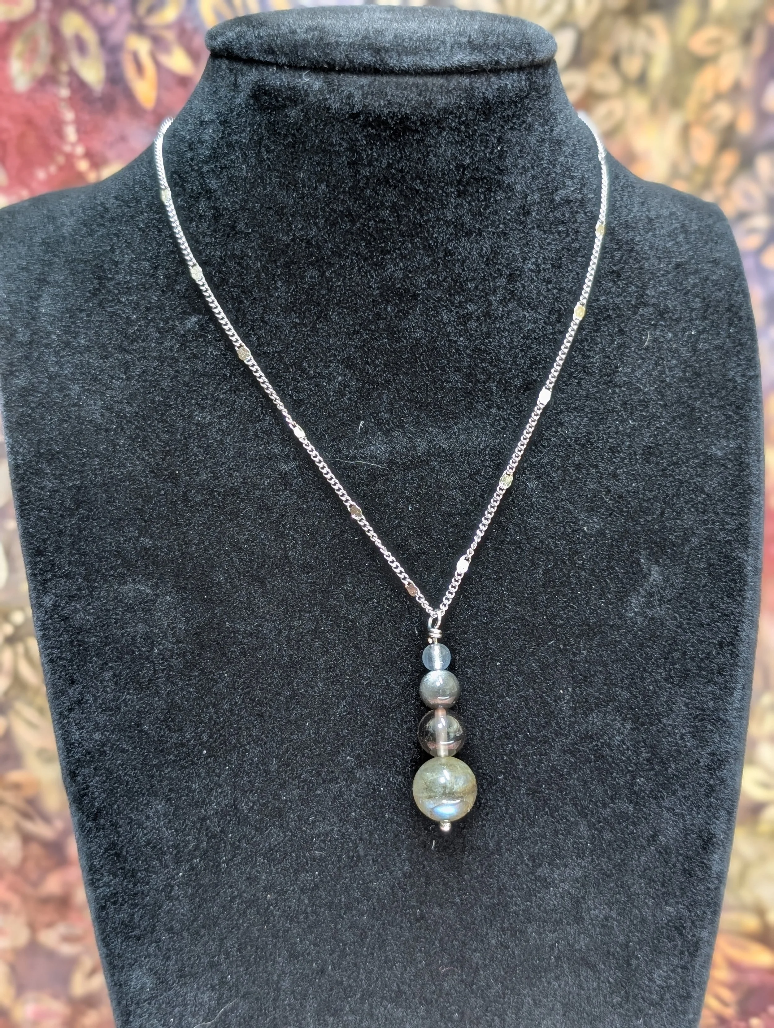 Necklace made with labradorite, silver obsidian, smokey quartz, and labradorite 
