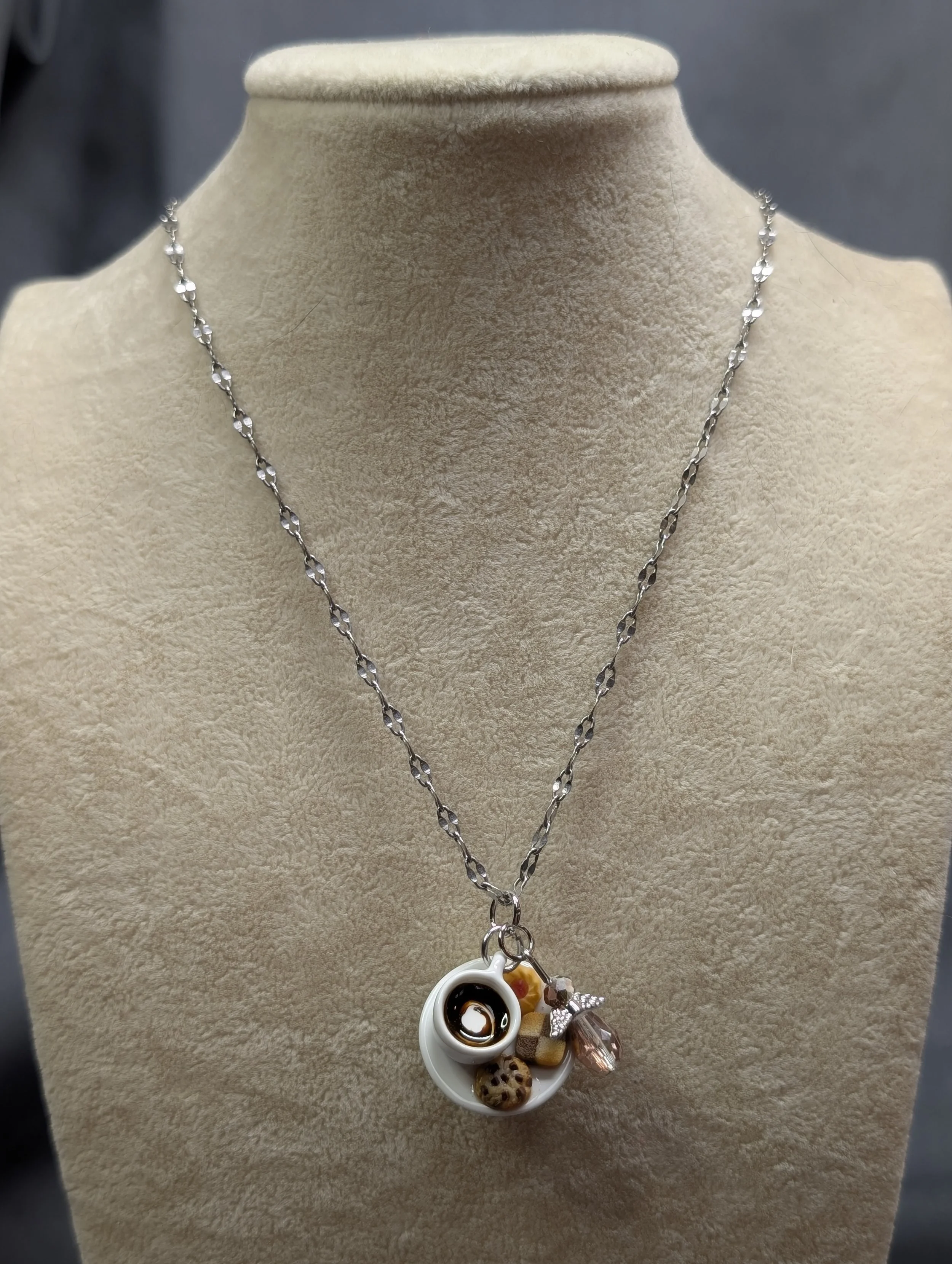 Custom order of a coffee and baked goods pendant with an angel