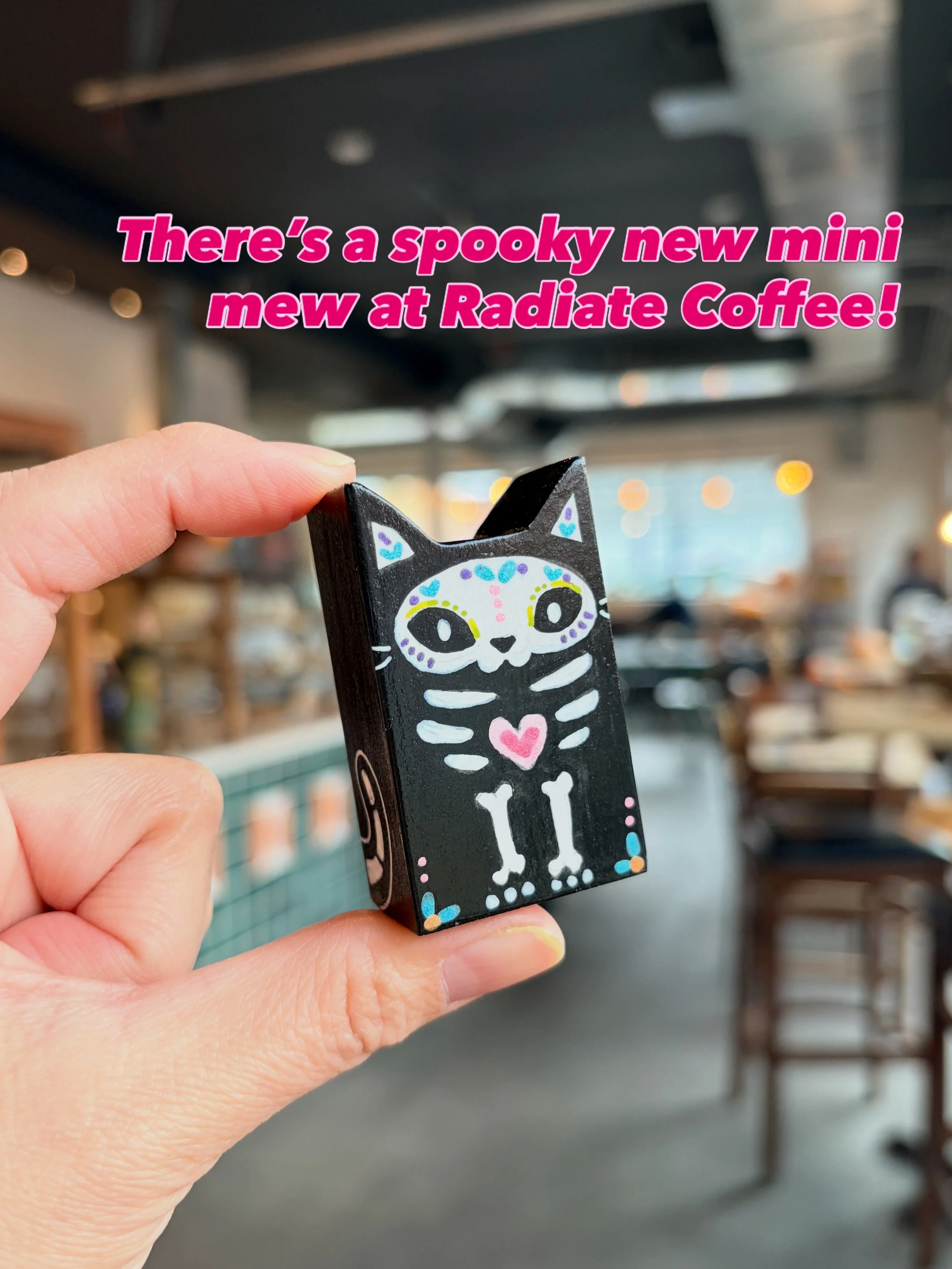 Hop on your broomstick and fly on down to @radiatecoffeecommunity for a spooky mini mew. 🦇Bats, ghosts and a new Dia De Los Muertos kitties are waiting for their purrfect haunted house. 👻 Beware, they will vanish after Halloweeeeeen!