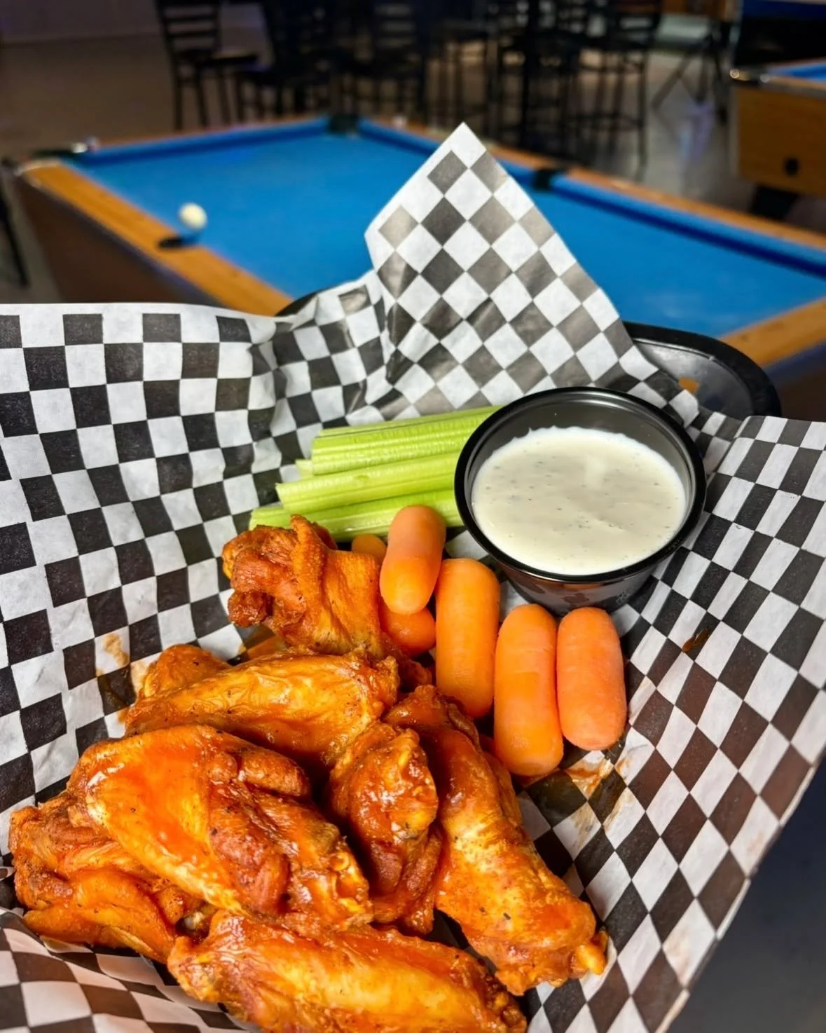 Wings, a pool table, and FREE play Monday&ndash;Thursday (noon&ndash;6 PM). You can&rsquo;t beat it! Pair it with our happy hour drink specials and you&rsquo;ve got the perfect hangout.