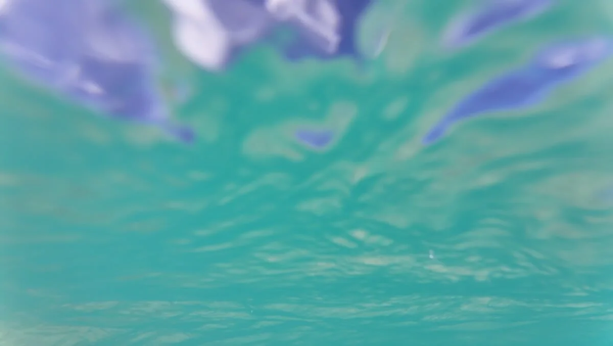 Bright turquoise water under the Caribbean Sea looking up through the surface of the sea to blue sky. Ocean Inspiration on The Sea Change Retreat with Kat Byles