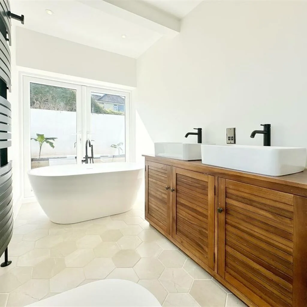 A modern bathroom transformation &mdash; featuring a freestanding tub, walk-in shower, and double vanity for the perfect blend of style and functionality. Built with precision by Avon Valley Construction.

#ConstructionLife #BuildingDreams #QualityCr