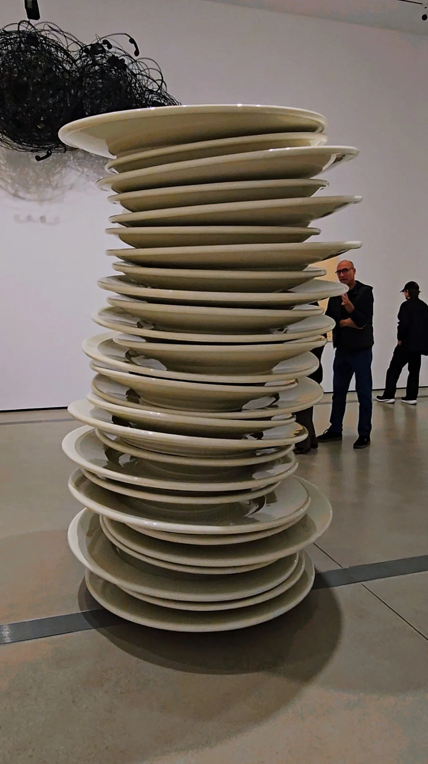 Robert Therrien monumental plate sculpture at The Broad Museum in Los Angeles, exploring scale,silence, and spatial perception.