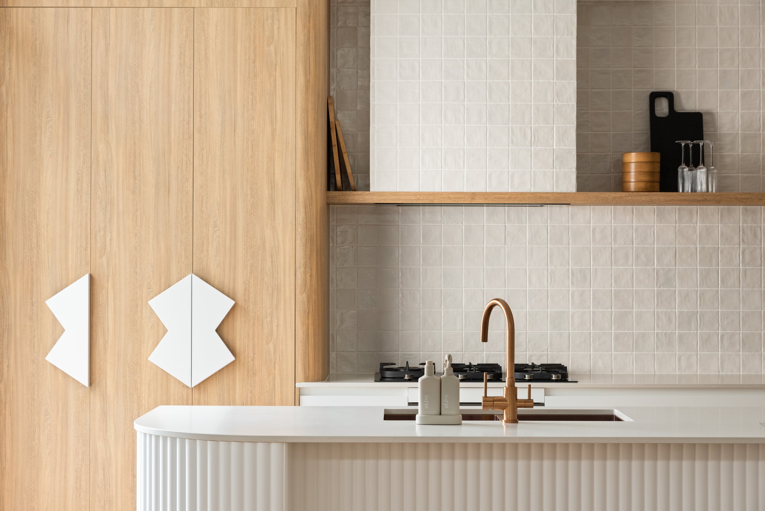 Kitchen with white tiles
