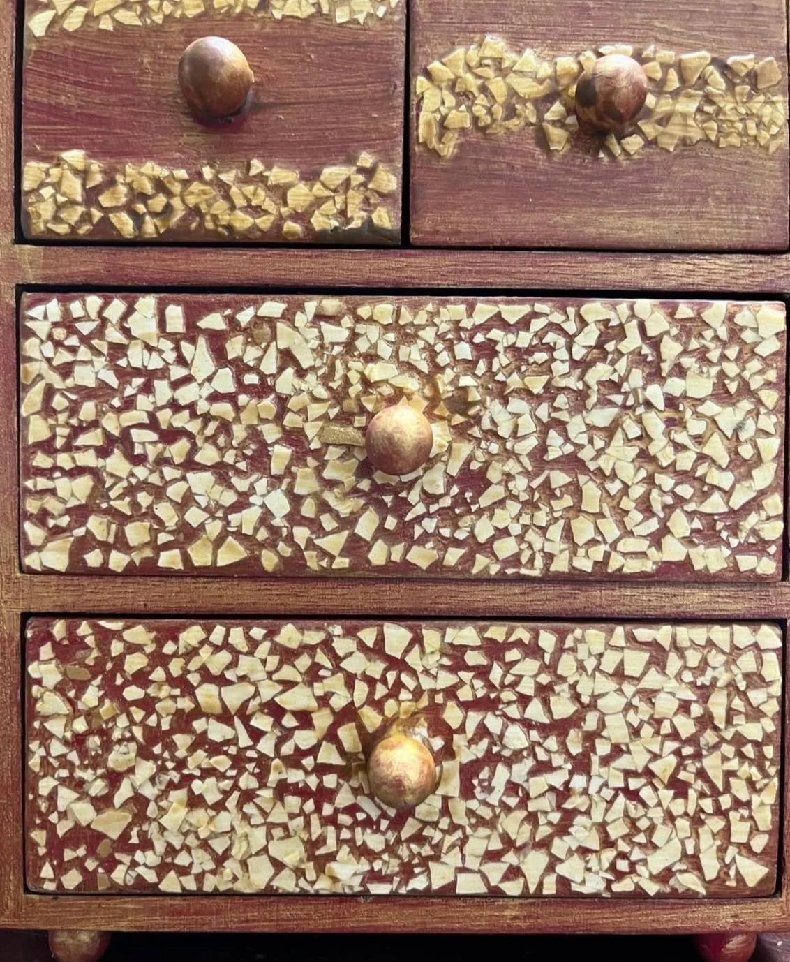 Catherine Engelmeyer Art eggshell on a chest of drawers.jpeg