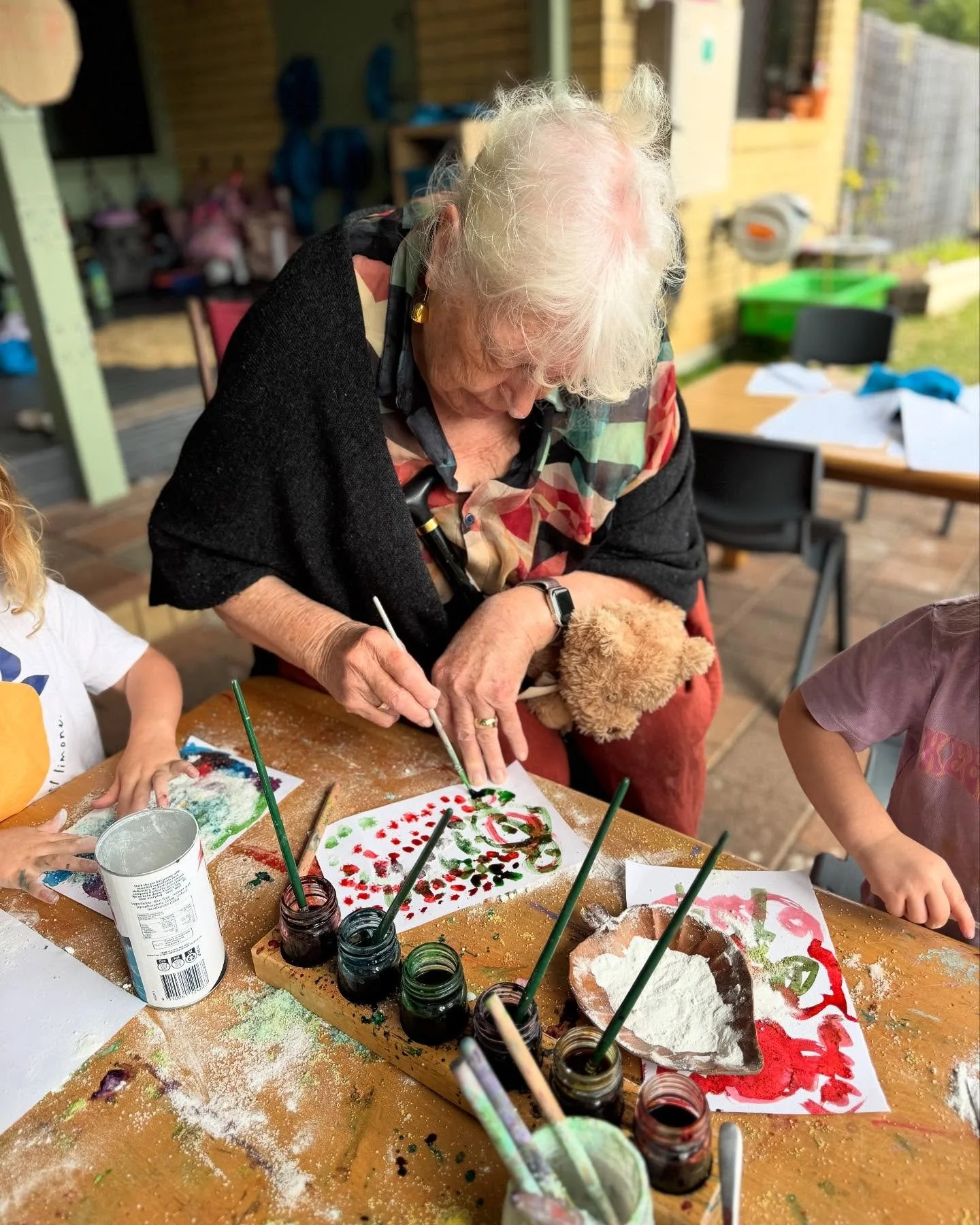 ✨ The Day an 87-Year-Old Conquered a Preschool Chair. 
In our Grand Friends program, reablement isn&rsquo;t just a theory. 
One of our 87-year-old Grand Friends set herself a determined goal:  to sit on one of the tiny preschool chairs so she could j