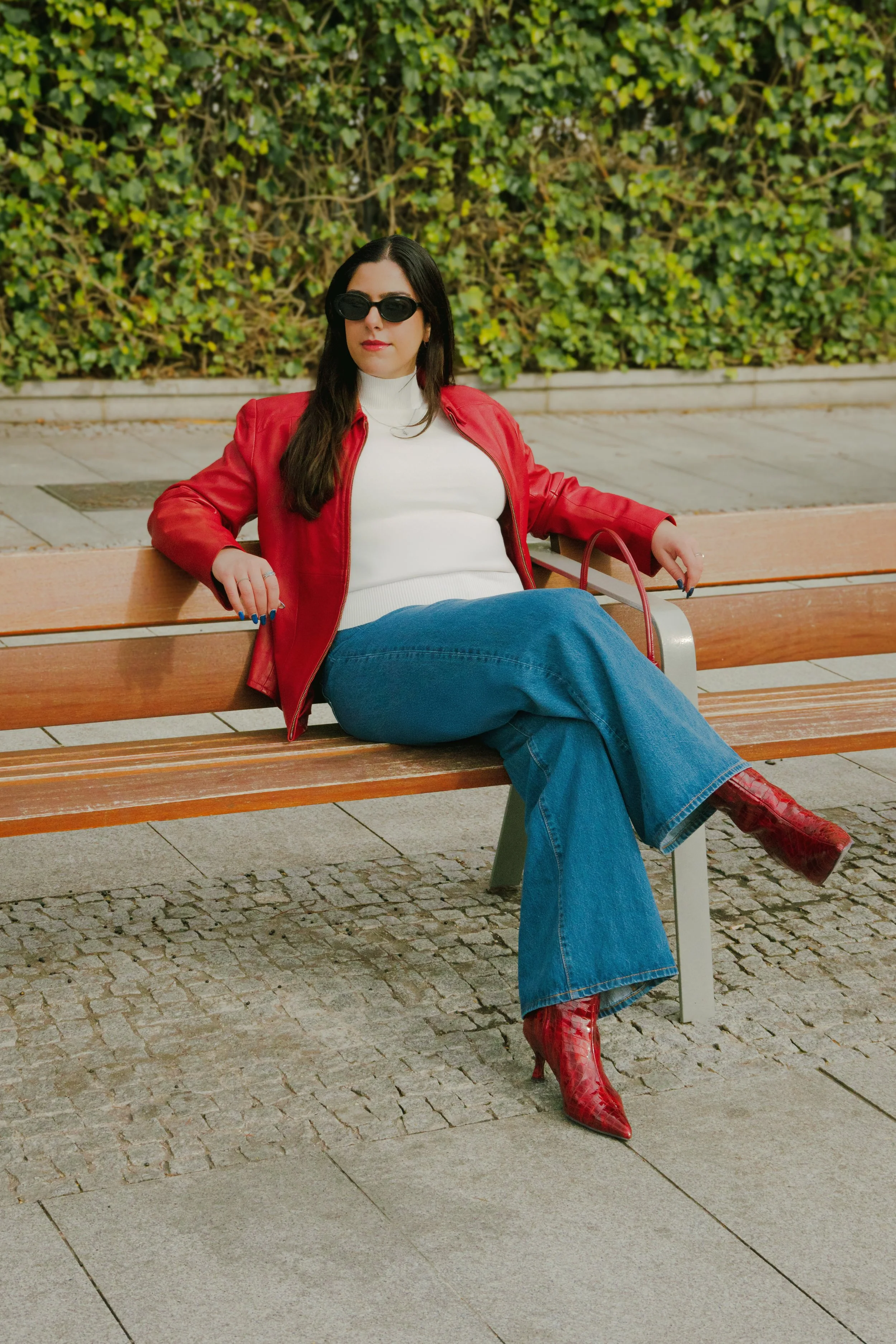 Red jacket sat down.jpeg