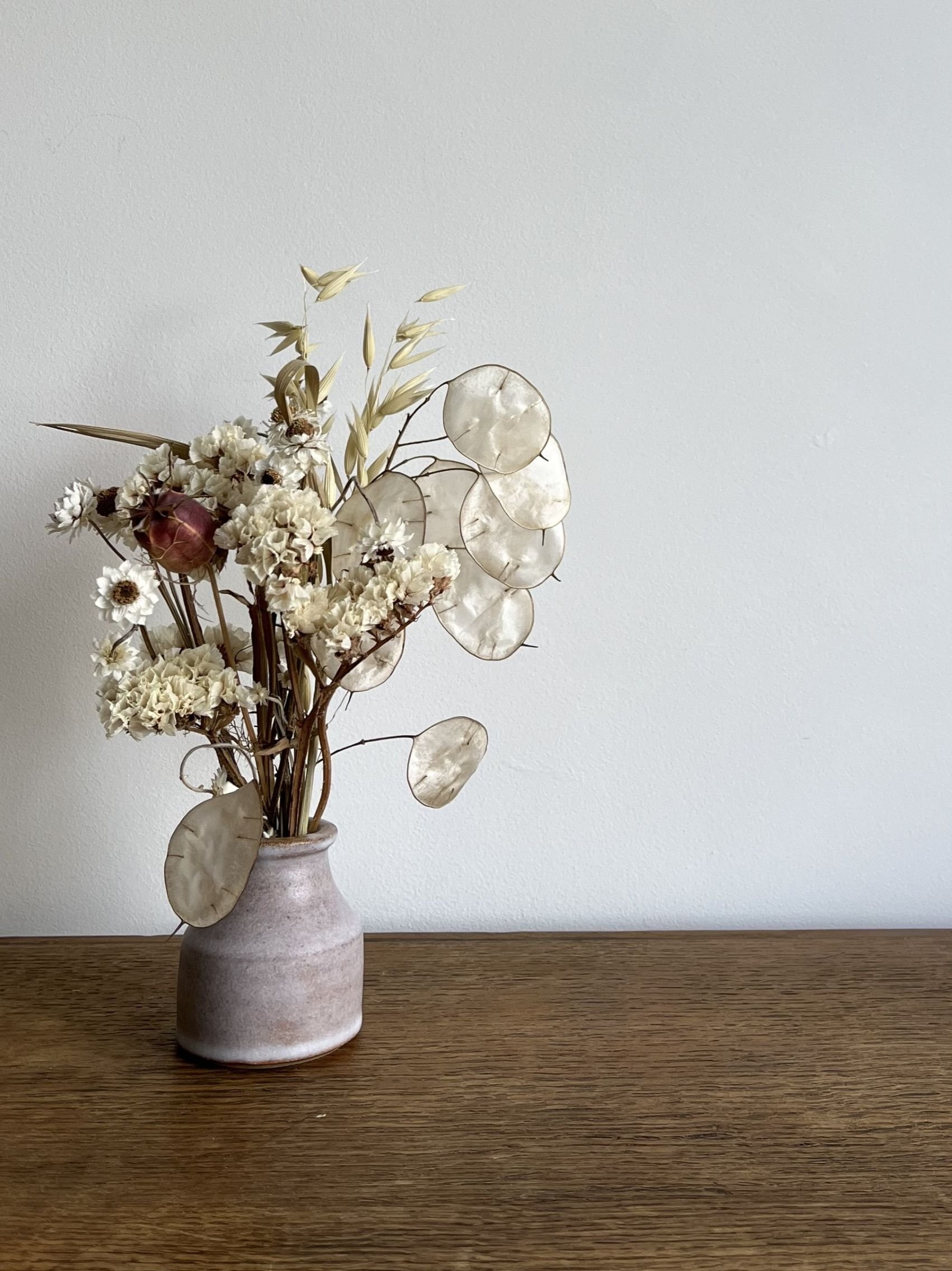 hand madestoneware bud vase with flowers