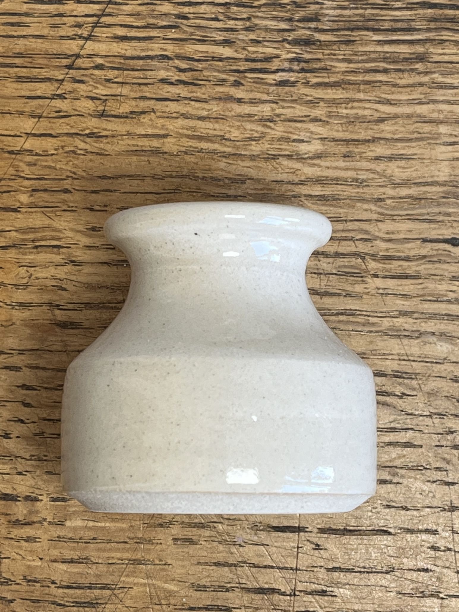 hand made stoneware bud vase in a neutral tone