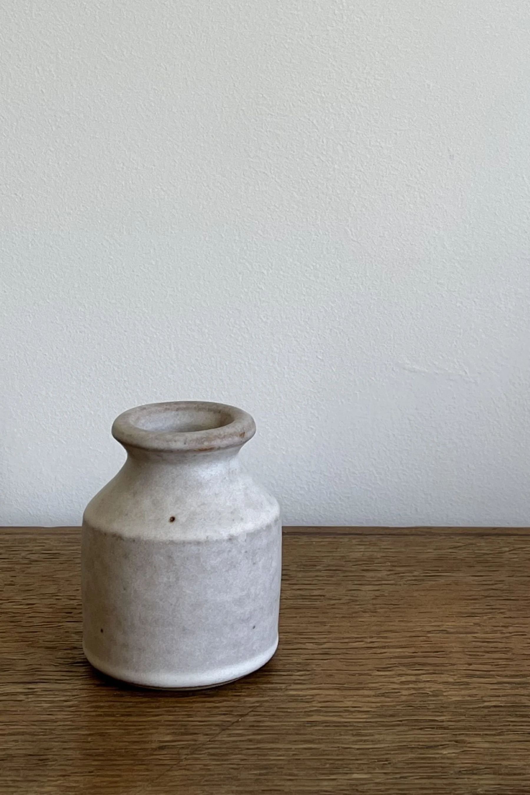 Handmade Stoneware Bud Vase in an off-white satin glaze.
