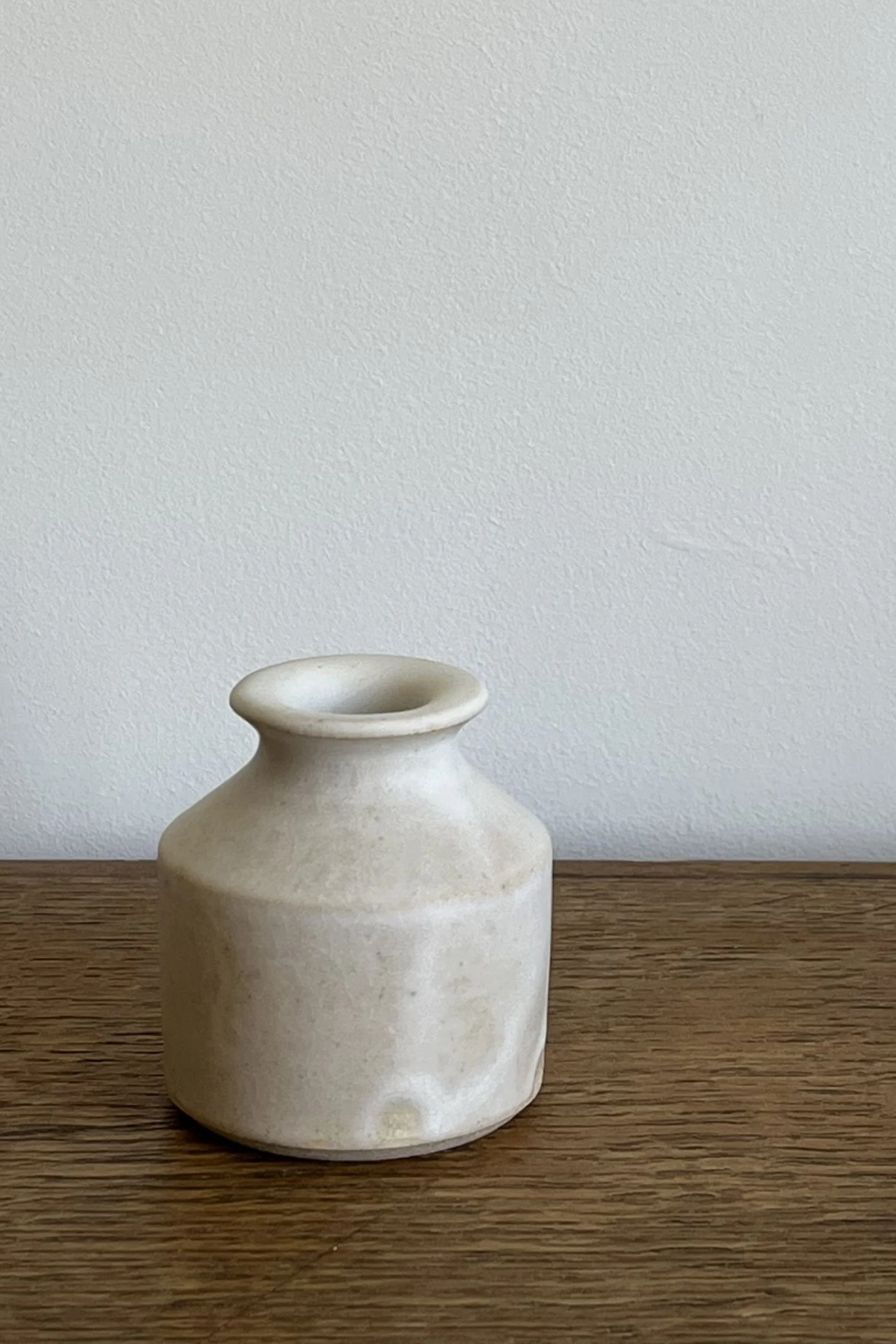 Handmade Stoneware Bud Vase in an off-white satin glaze.