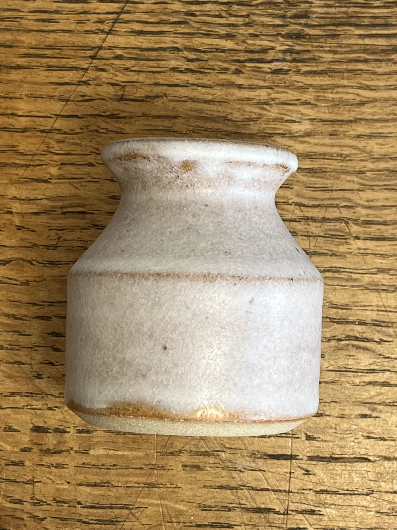 hand made stoneware bud vase in an Off-White Glaze