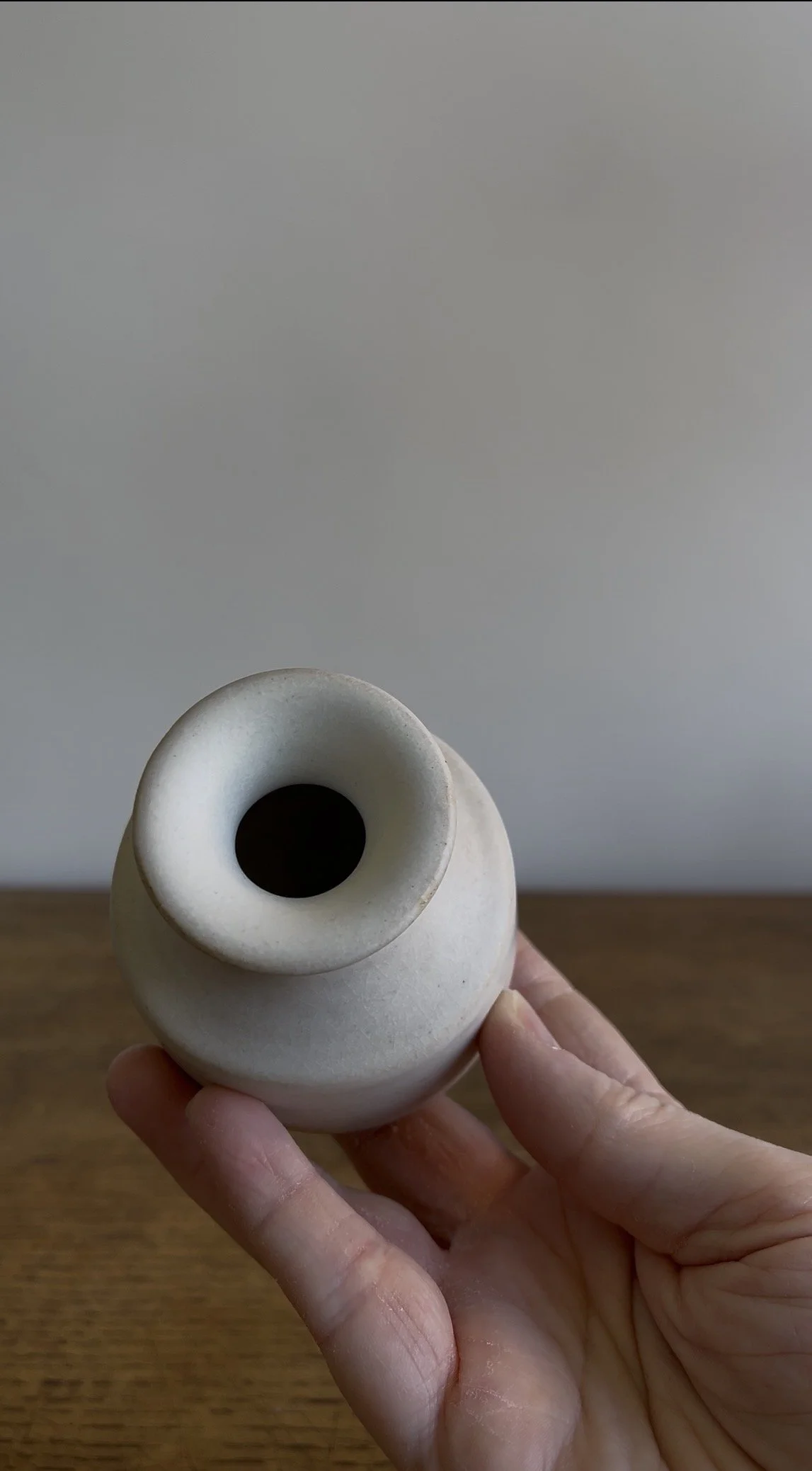Handmade Stoneware Bud Vase in an off-white satin glaze.