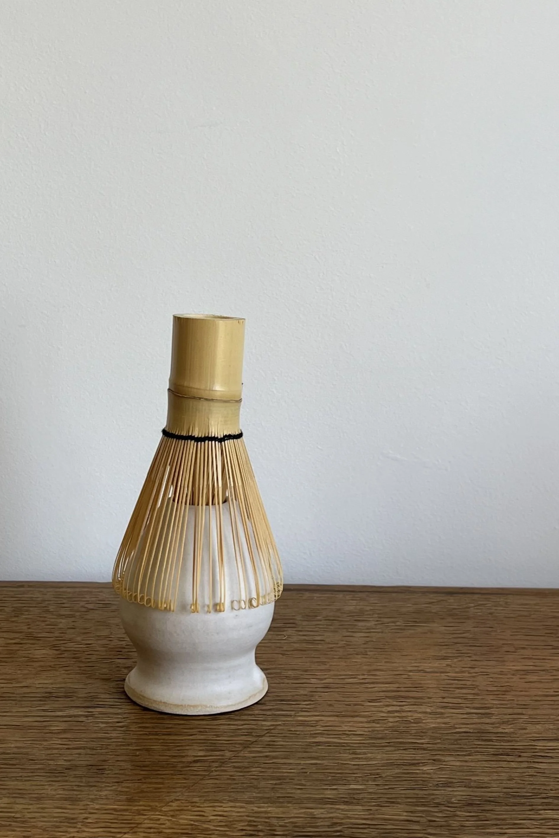 Handmade Stoneware Matcha Whisk Holder with whisk.