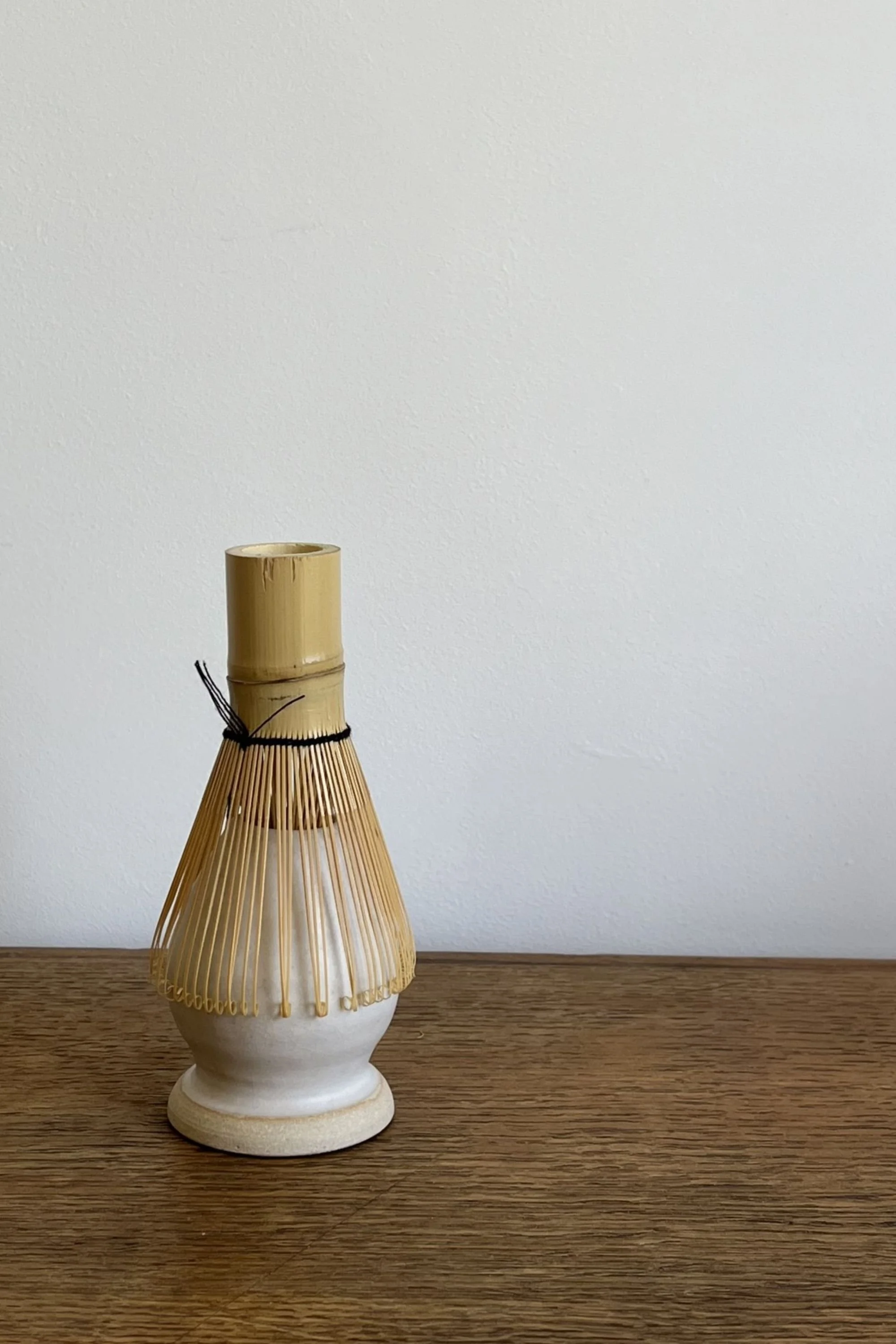 Handmade Stoneware Match Whisk Holder with whisk.