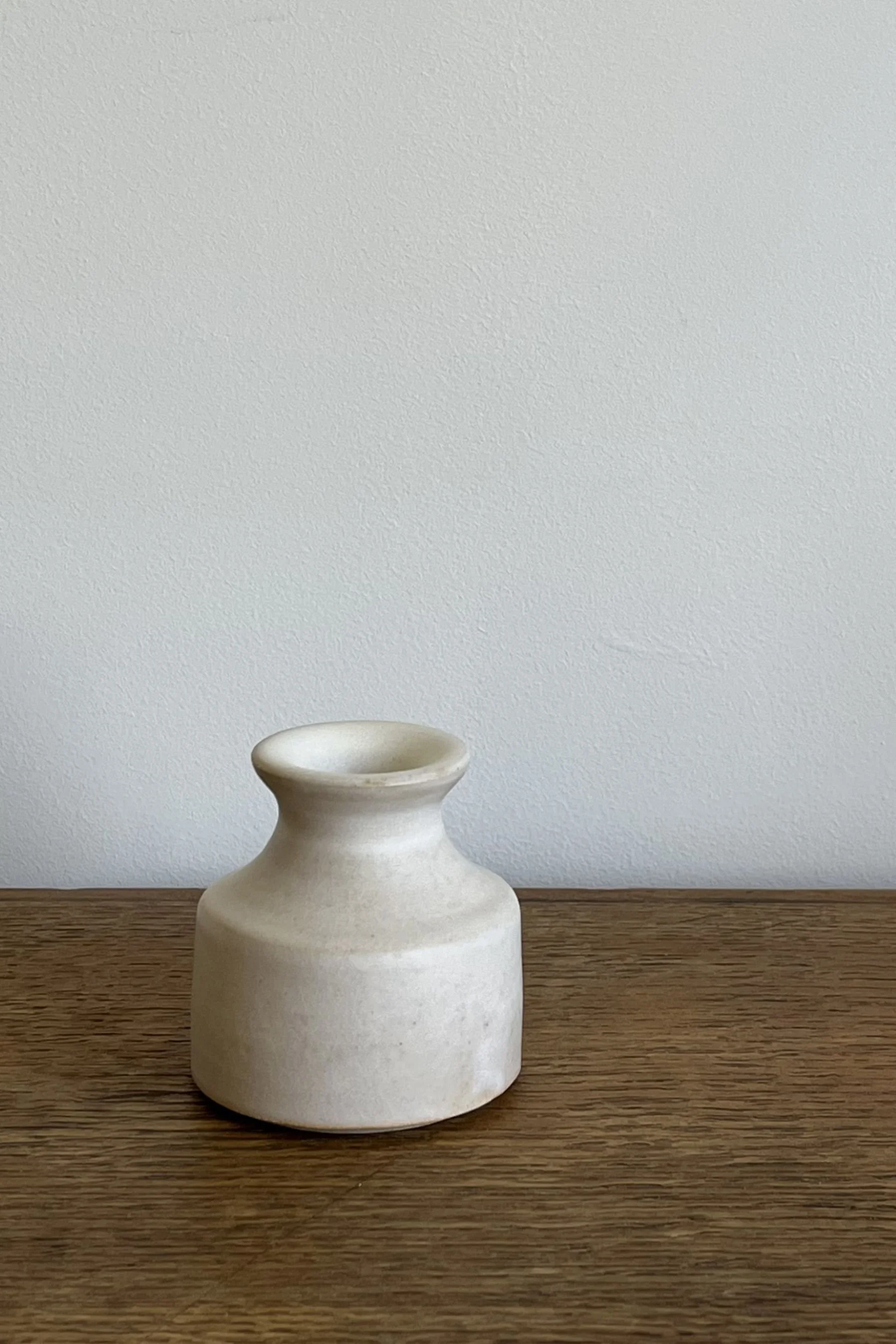 Handmade Stoneware Bud Vase in an off-white satin glaze.