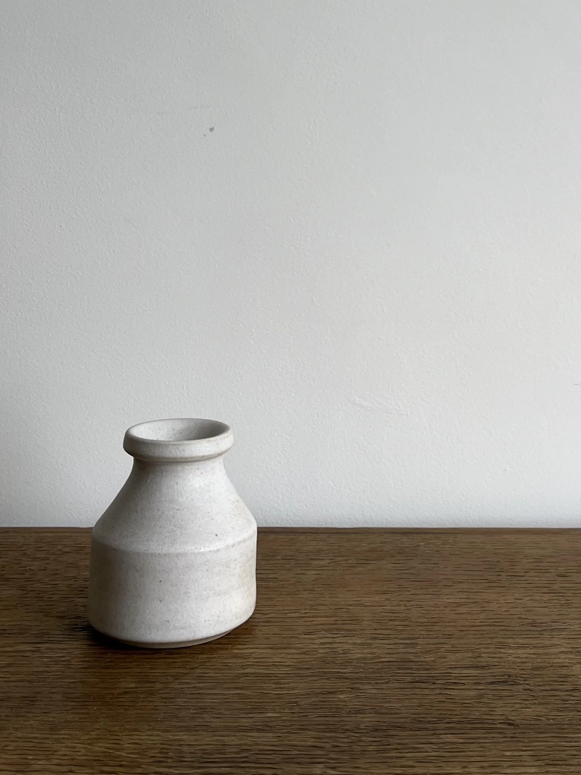 hand made stoneware bud vase in a matt white glaze