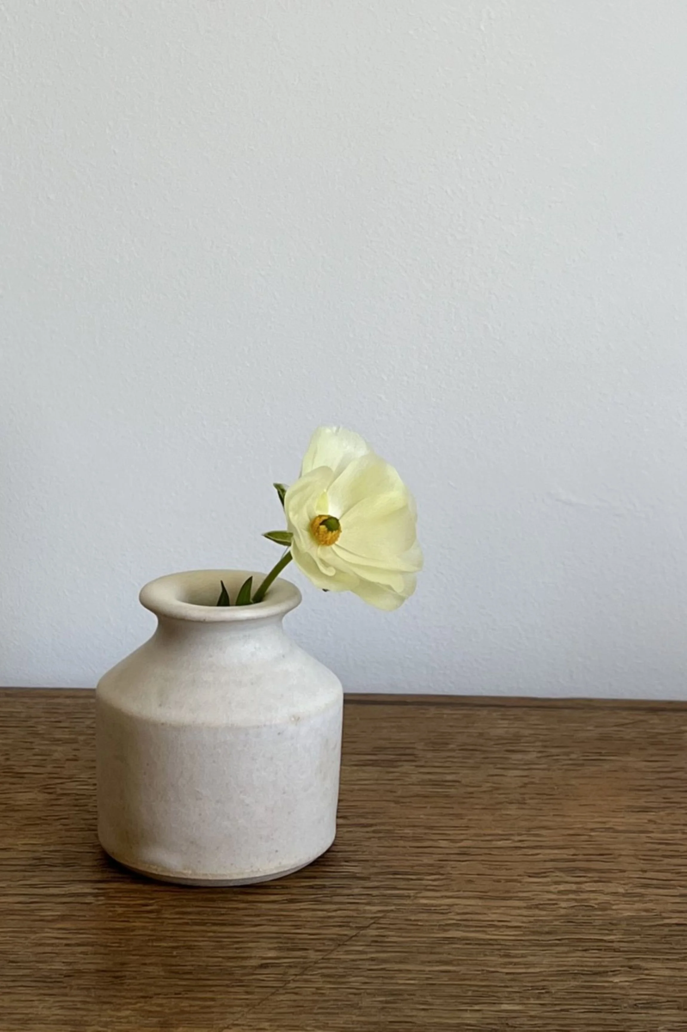 Handmade Stoneware Bud Vase in an off-white satin glaze.